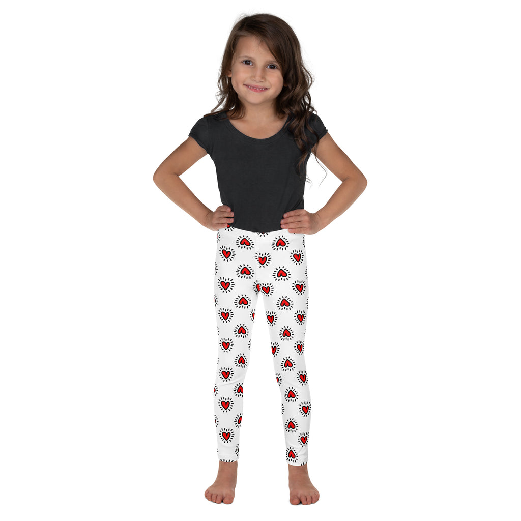 Girls Valentine’s Day buttery soft white leggings with red hearts and black radiating lines pattern