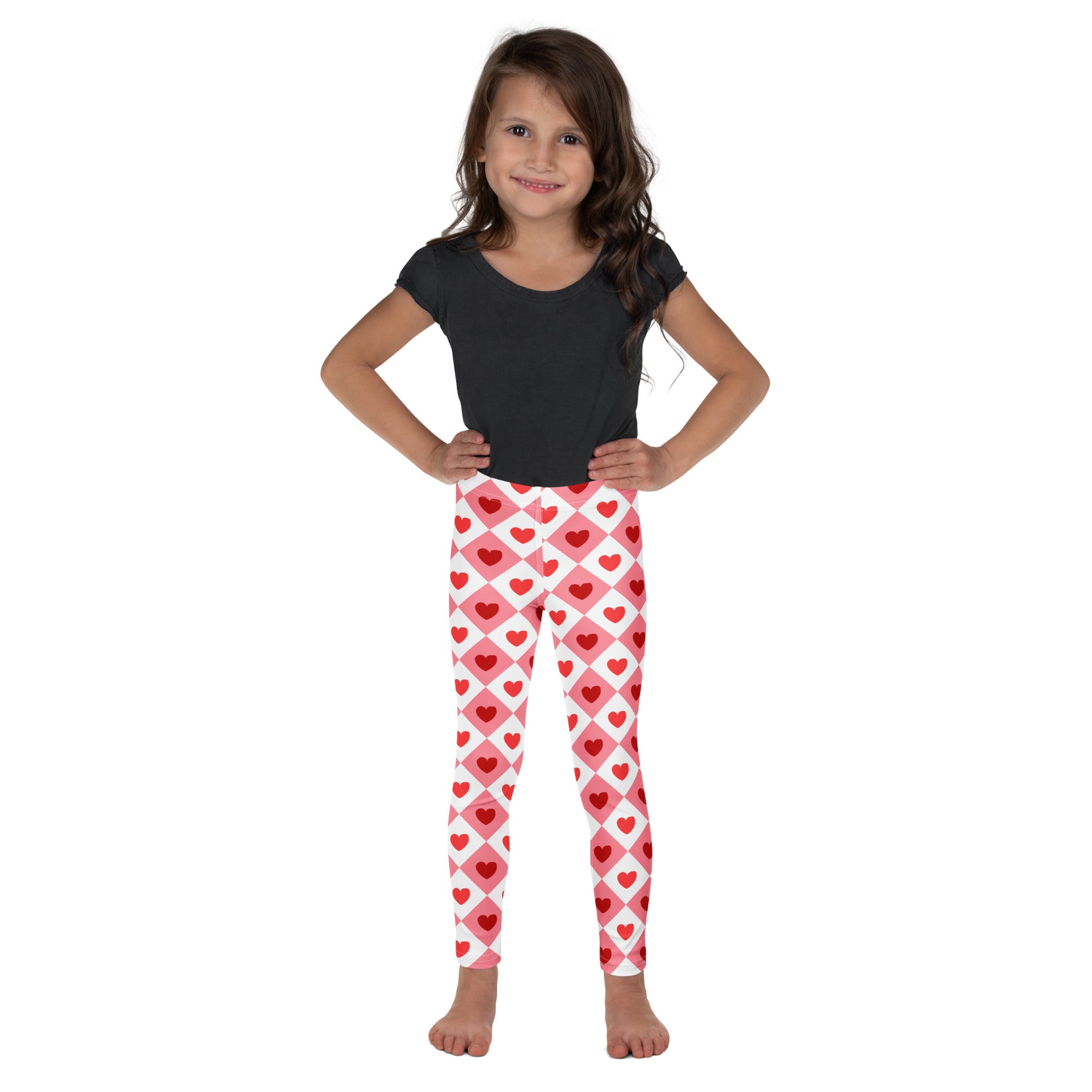 Girls pink argyle heart leggings with a diamond grid design made of buttery soft fabric for comfortable wear