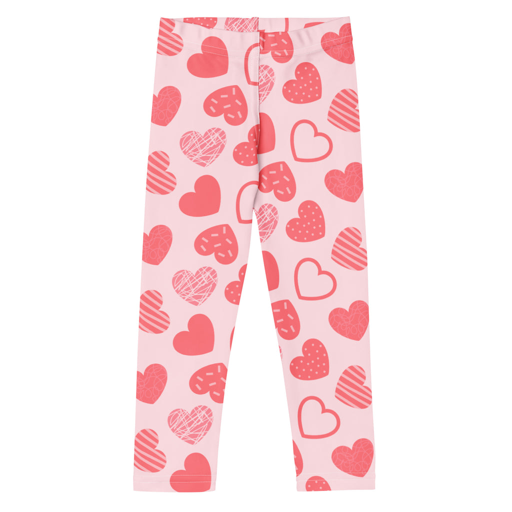 Girls pink heart pattern leggings made of buttery soft stretchy fabric with playful red heart designs