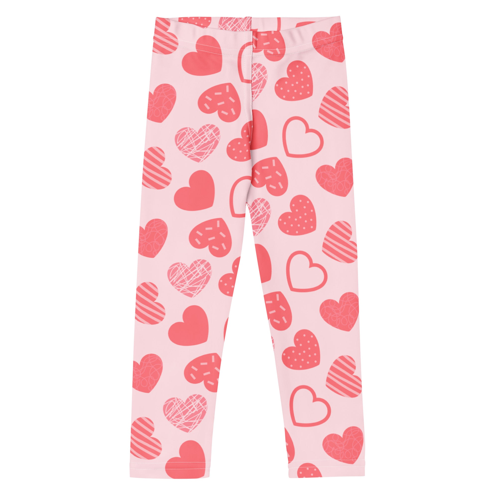 Girls pink heart pattern leggings made of buttery soft stretchy fabric with playful red heart designs