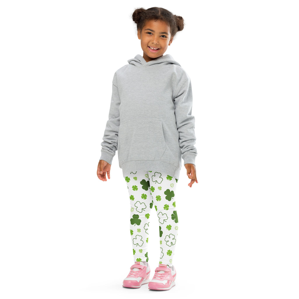 Gray hooded sweatshirt with long sleeves and front pocket worn over girls white buttery soft leggings with shamrocks