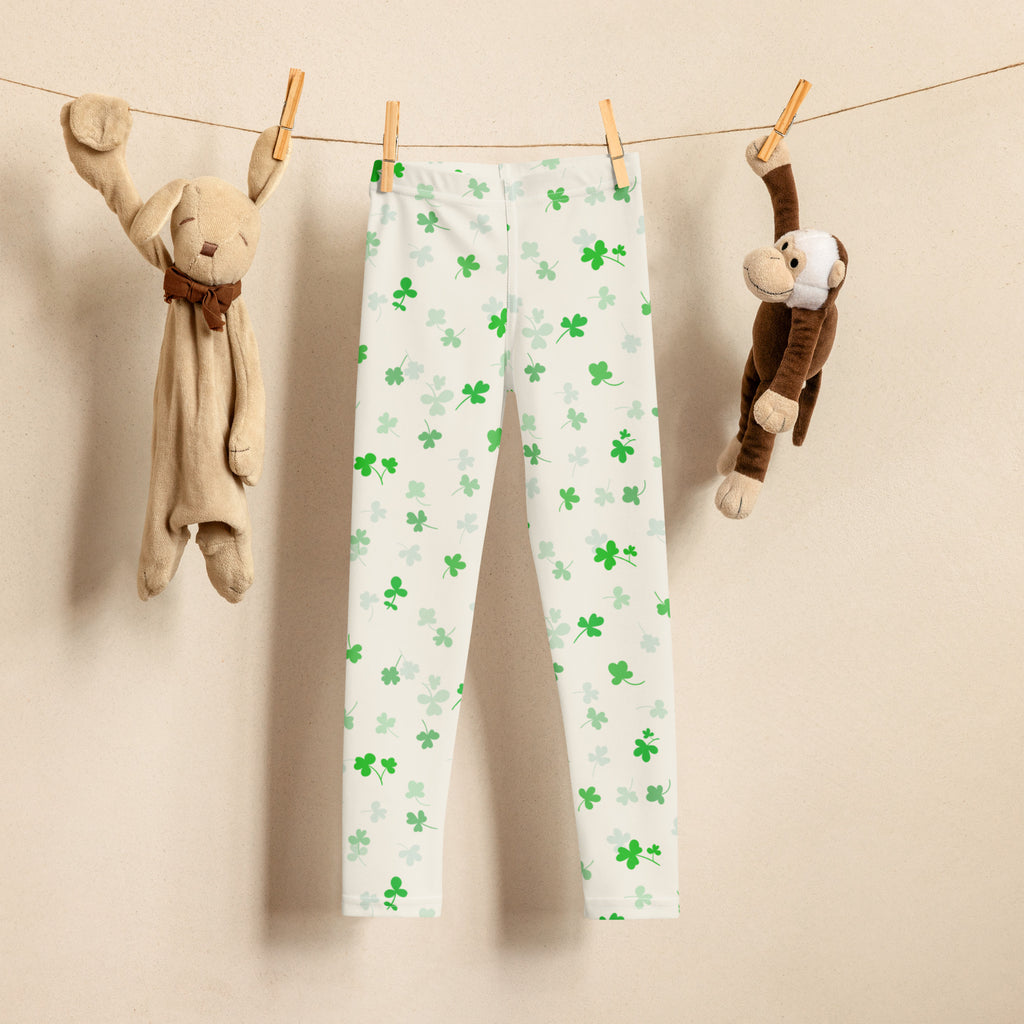 Girls shamrock buttery soft white leggings with green shamrock pattern designed for comfortable wear