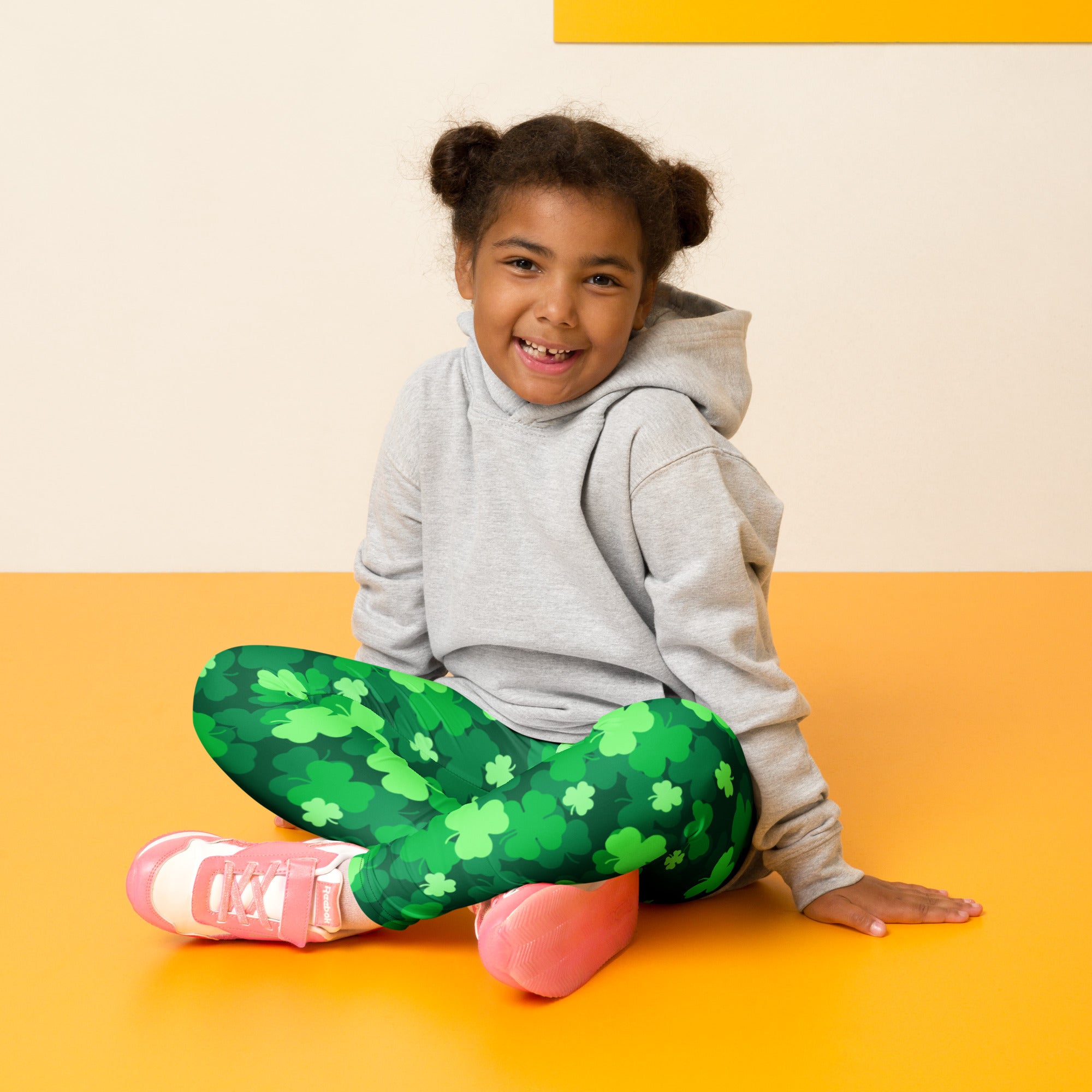 Girls emerald green shamrock buttery soft leggings featuring a stretchy comfortable fabric and festive pattern