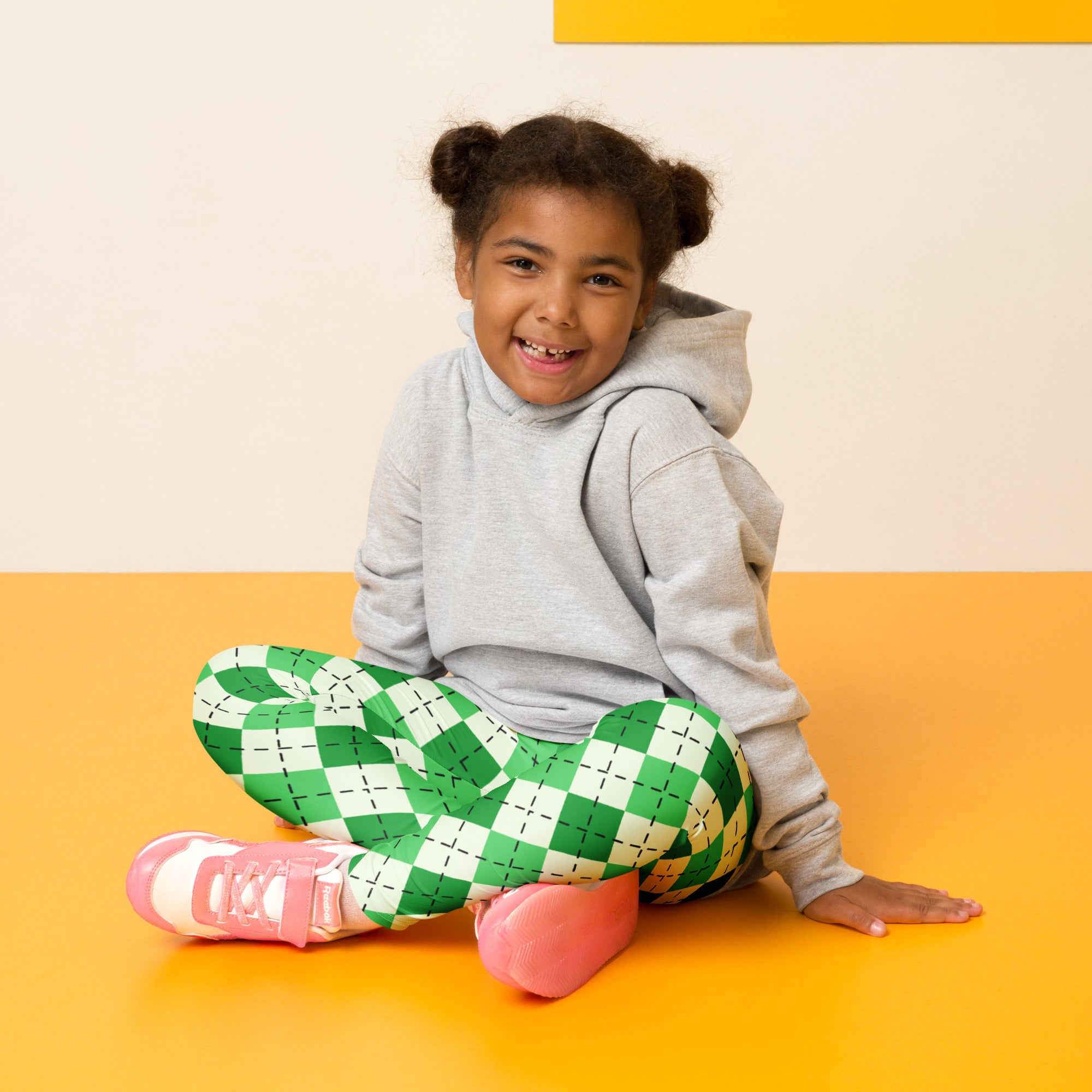 Girls green argyle st patricks day buttery soft leggings with green and white checkered pattern and black dashed lines