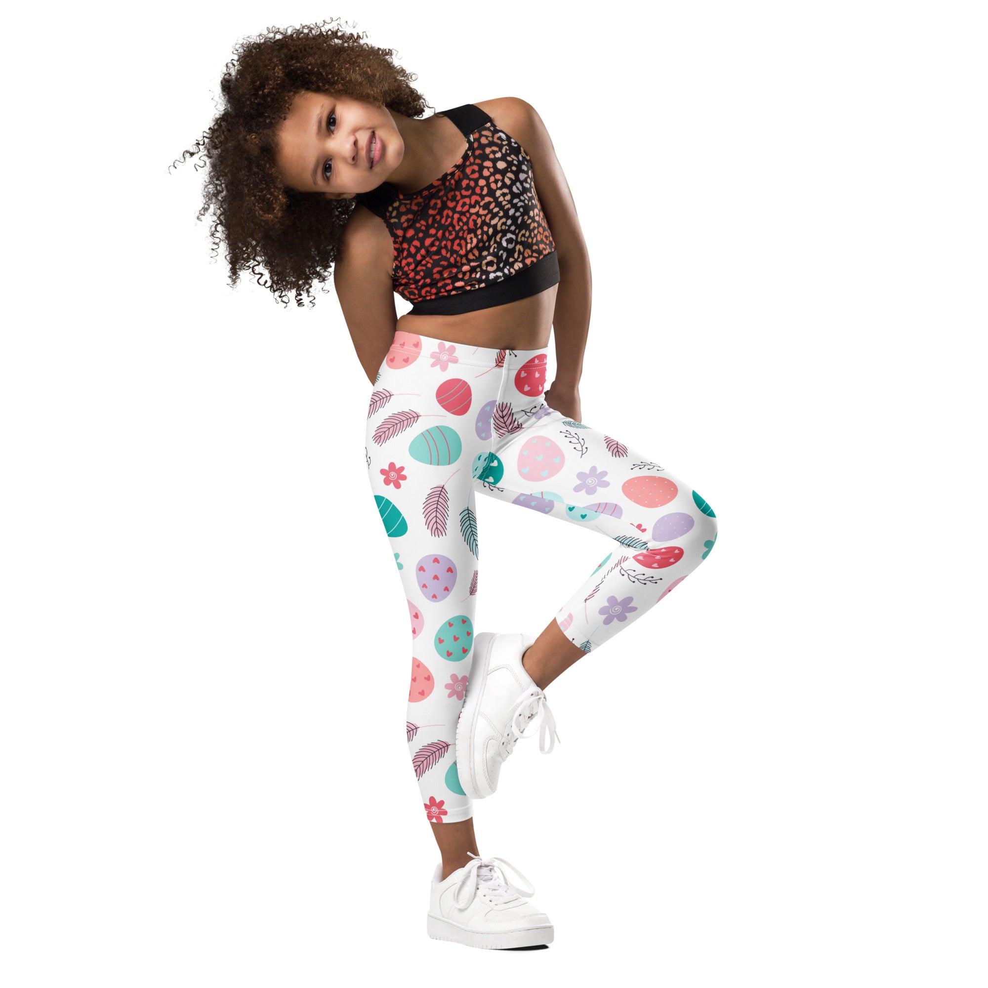 White kids leggings with playful colorful eggs feathers and flowers pattern buttery soft for easter wear
