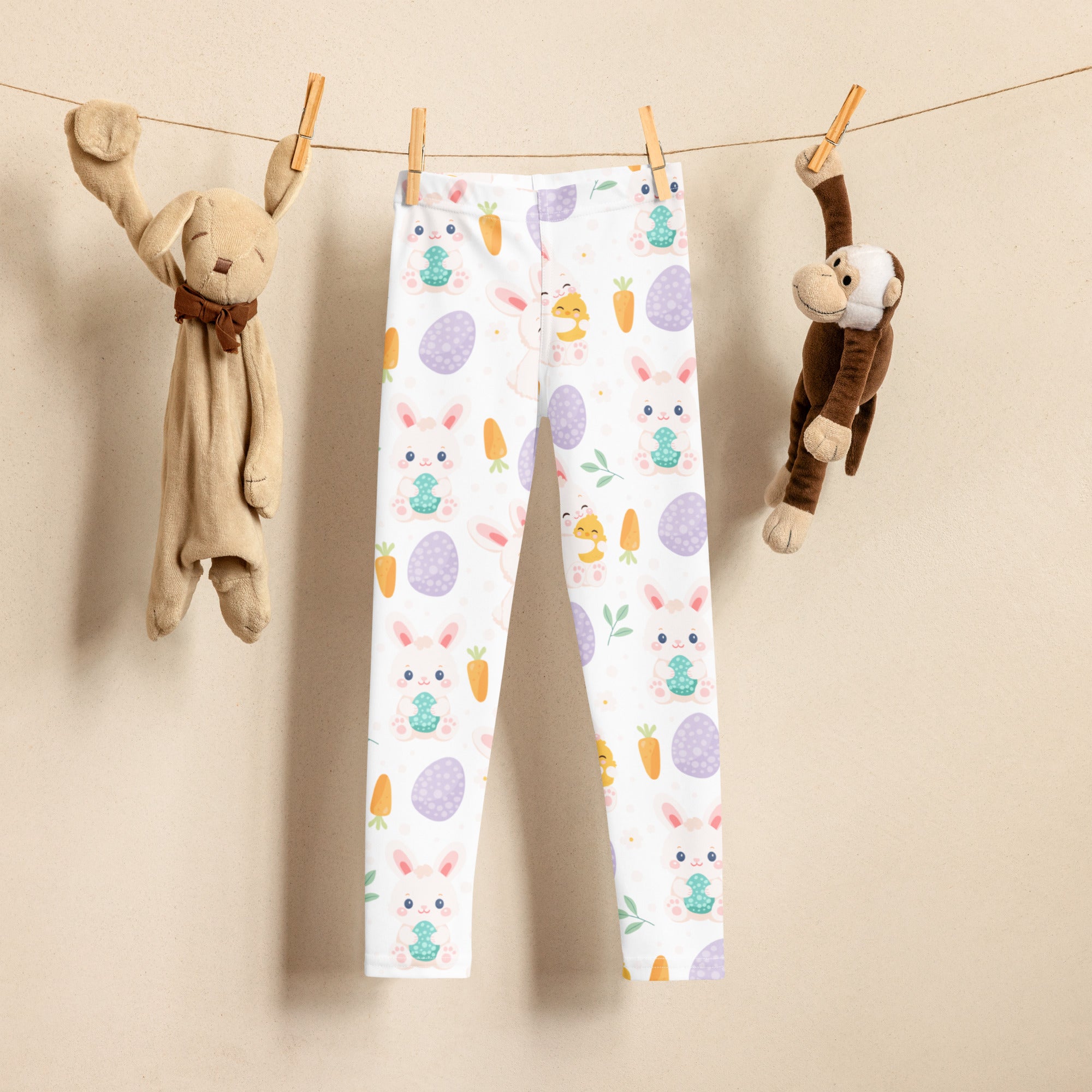 Girls cute Easter bunny buttery soft white leggings with pastel purple eggs orange carrots and cartoon bunnies and chicks