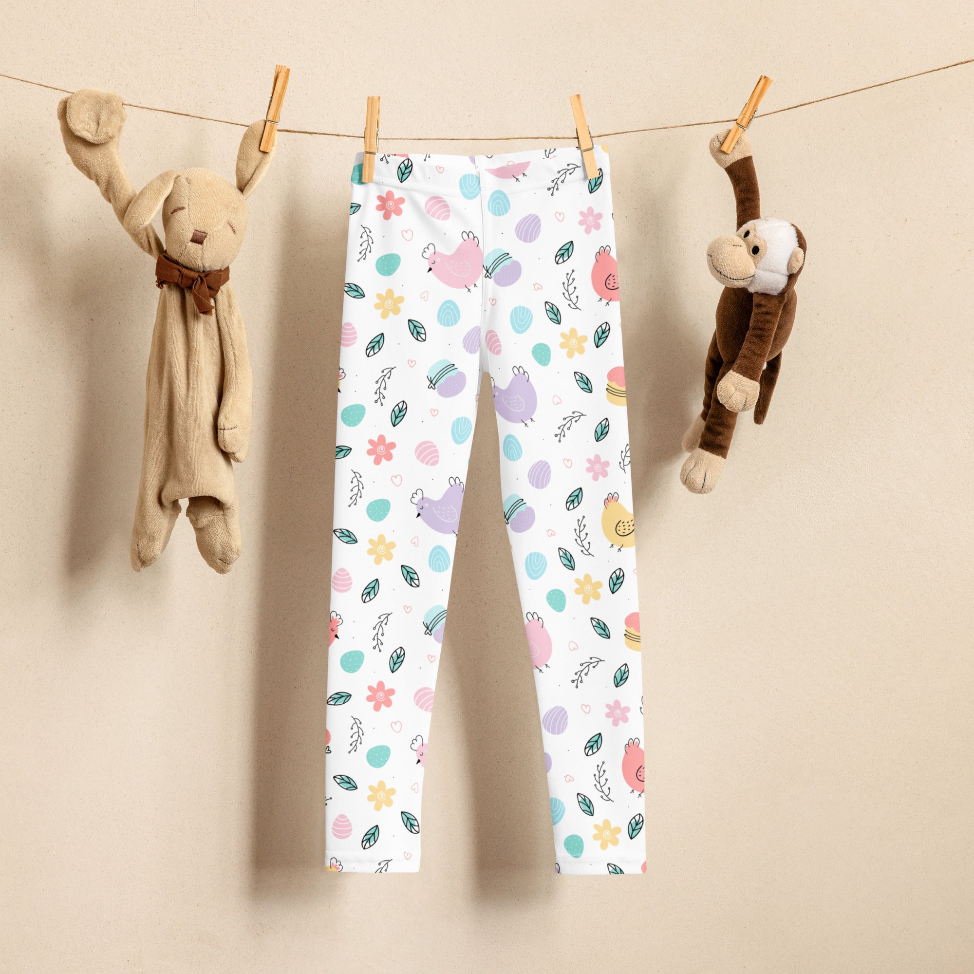 Girls pastel easter chick buttery soft white leggings with playful pastel eggs flowers and cartoon birds pattern