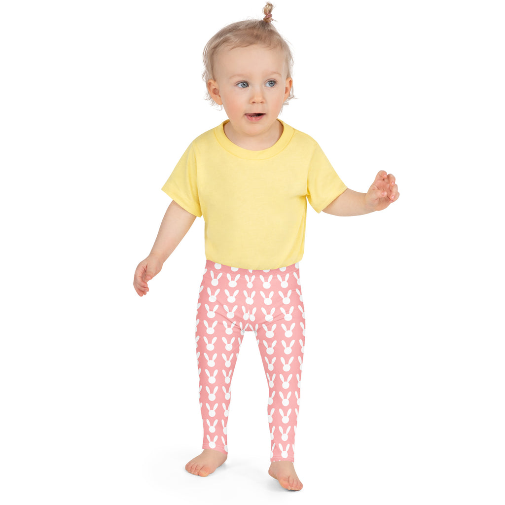 Girls pink buttery soft leggings with a repeating white bunny pattern perfect for easter wear