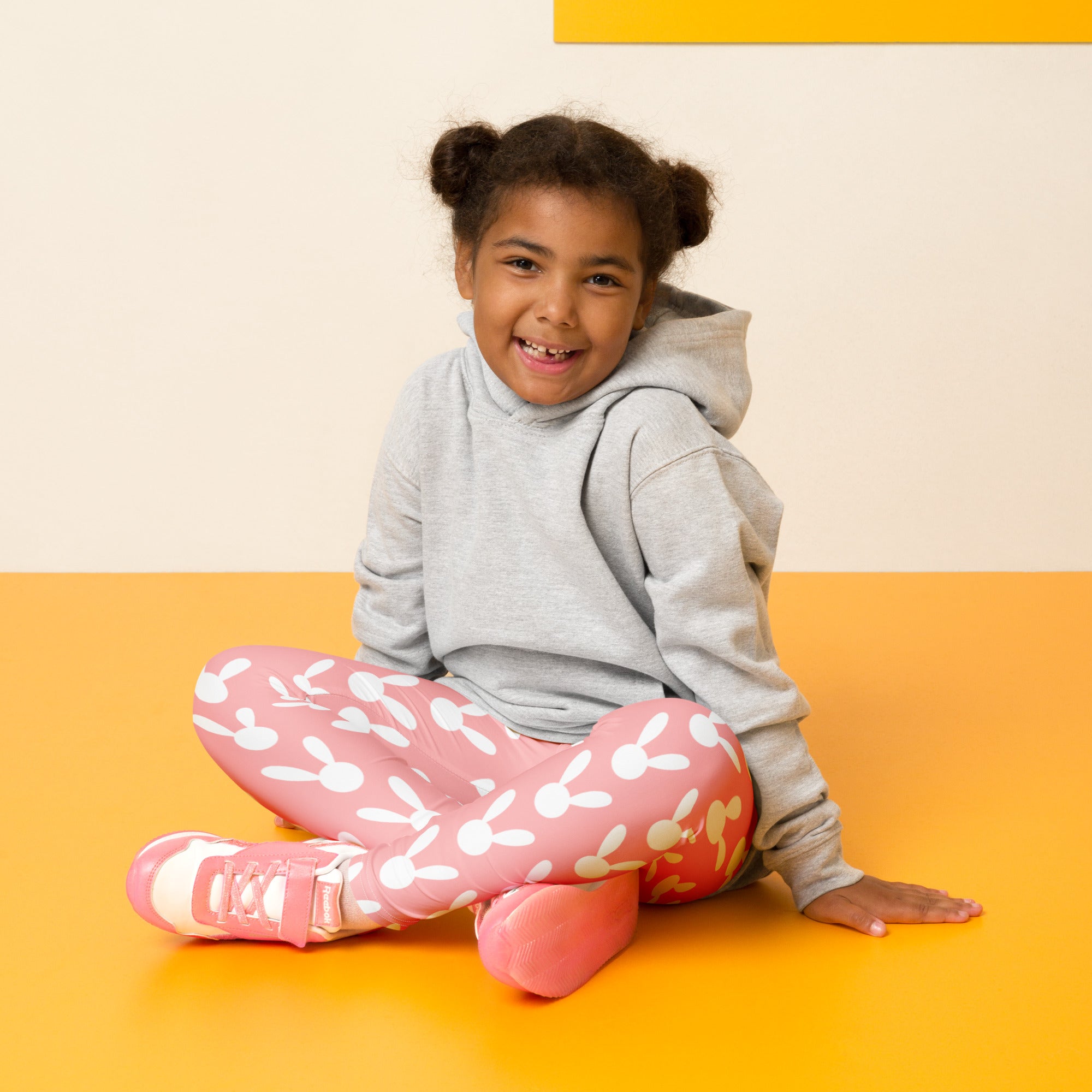 Girls pink buttery soft leggings with white bunny prints perfect for easter and everyday wear