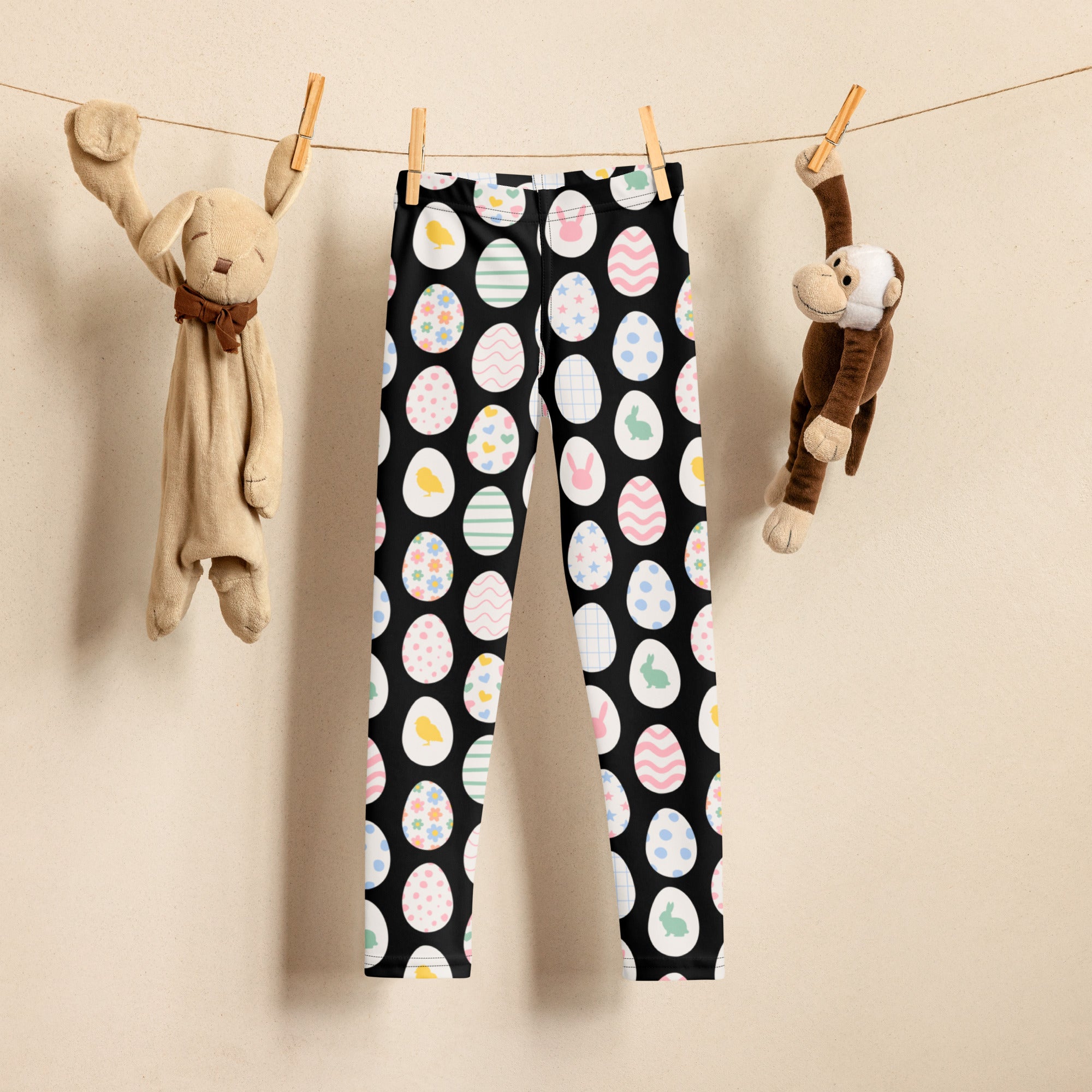 Girls black buttery soft leggings with colorful easter egg and bunny pattern perfect for festive wear