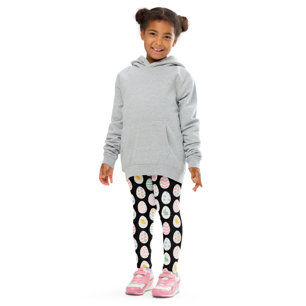 Gray hooded sweatshirt with long sleeves and front pocket paired with girls black Easter egg buttery soft leggings