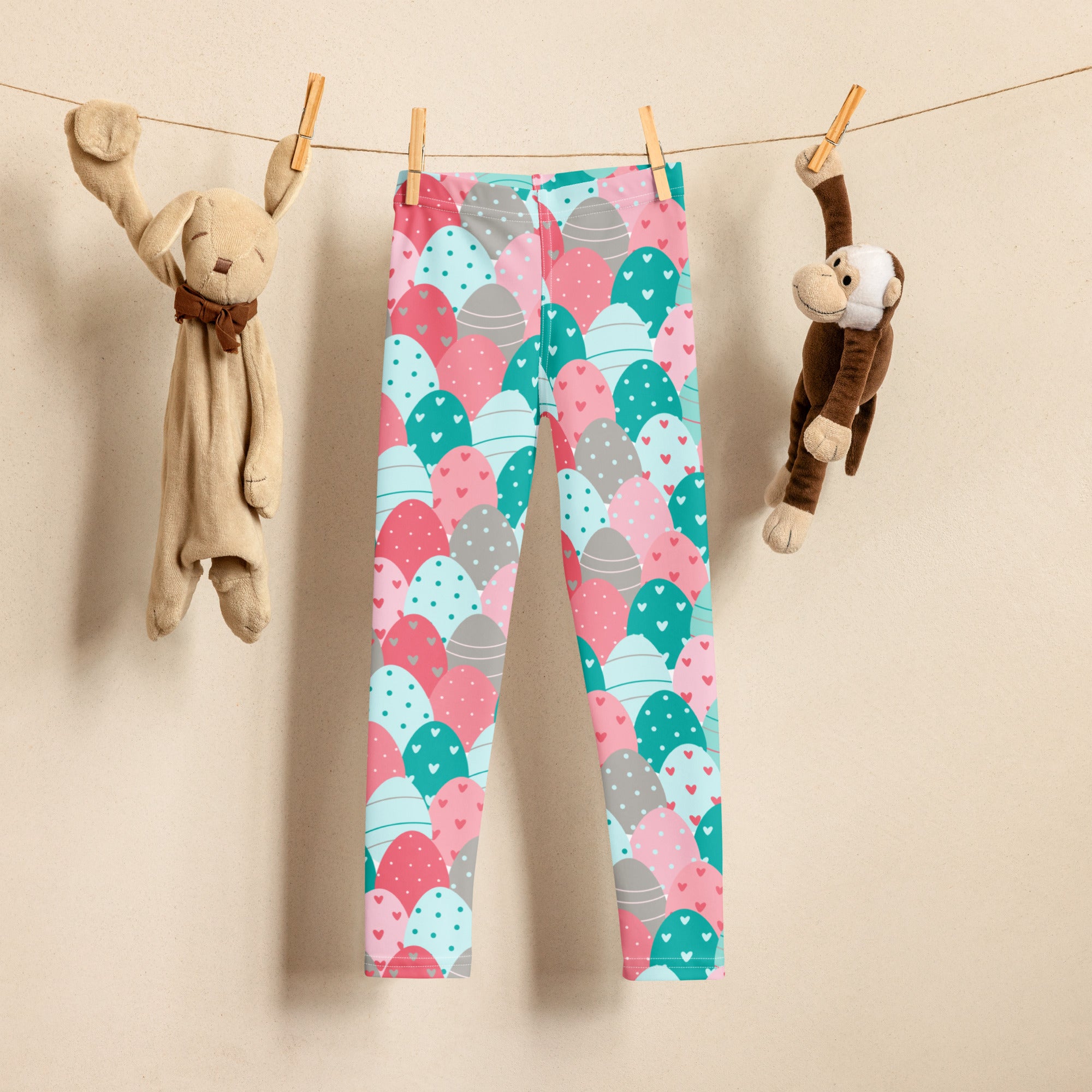 Girls pink and teal Easter eggs buttery soft leggings with pastel overlapping egg patterns and tiny heart details