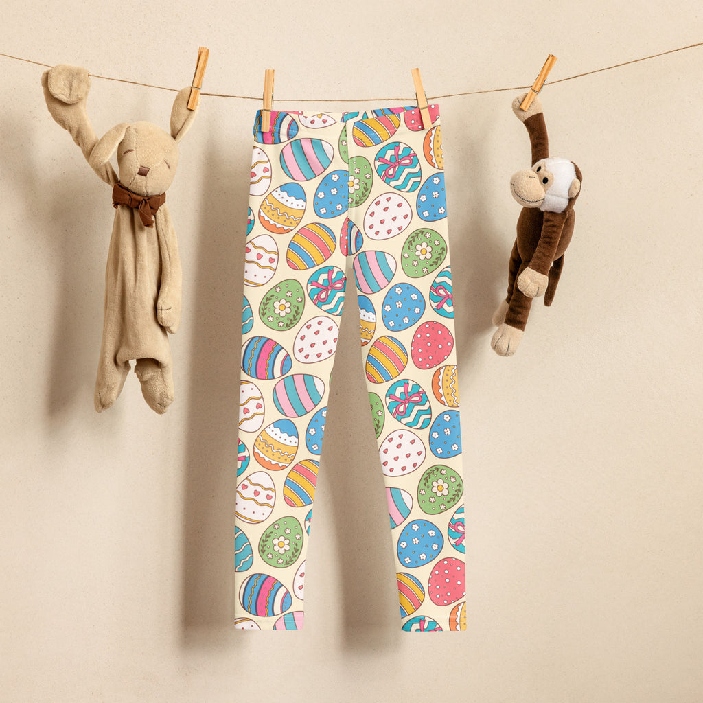 Girls vintage easter egg buttery soft leggings with colorful playful egg patterns on an off-white background