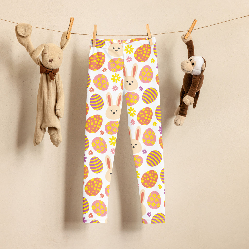 Girls orange bunny easter egg buttery soft white leggings with pastel pink yellow and orange playful patterns