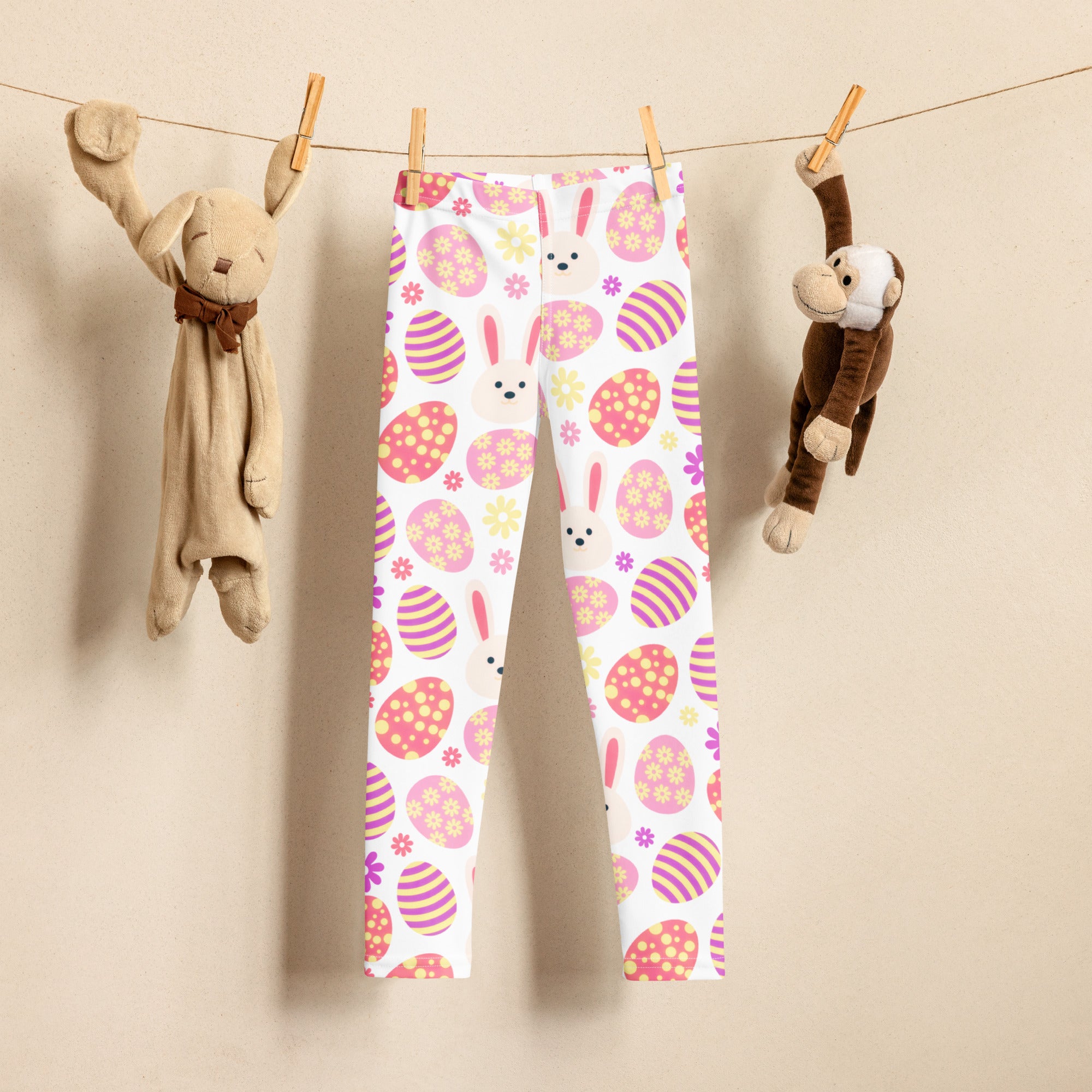 Girls pink bunny easter egg buttery soft white leggings with playful pink and purple egg and floral pattern