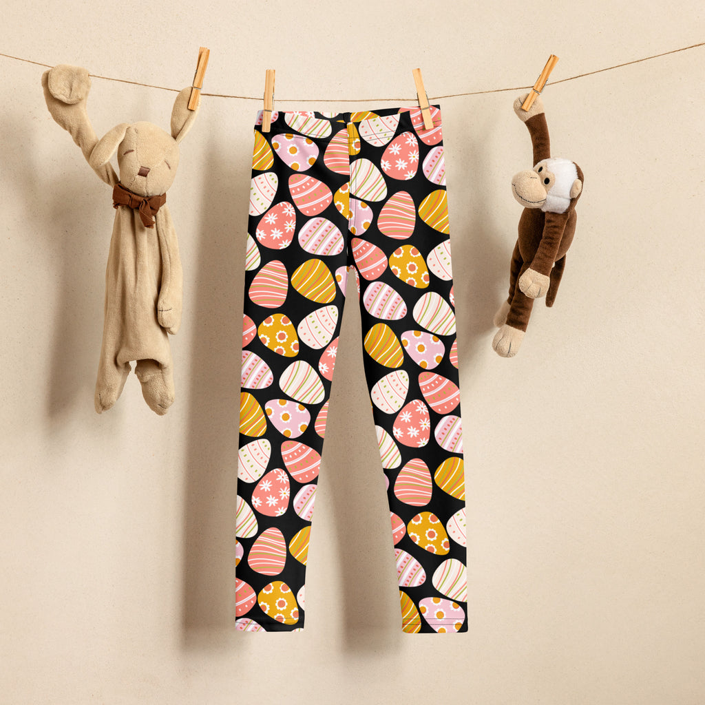 Girls bold easter egg buttery soft black leggings with pastel pink yellow and white egg pattern