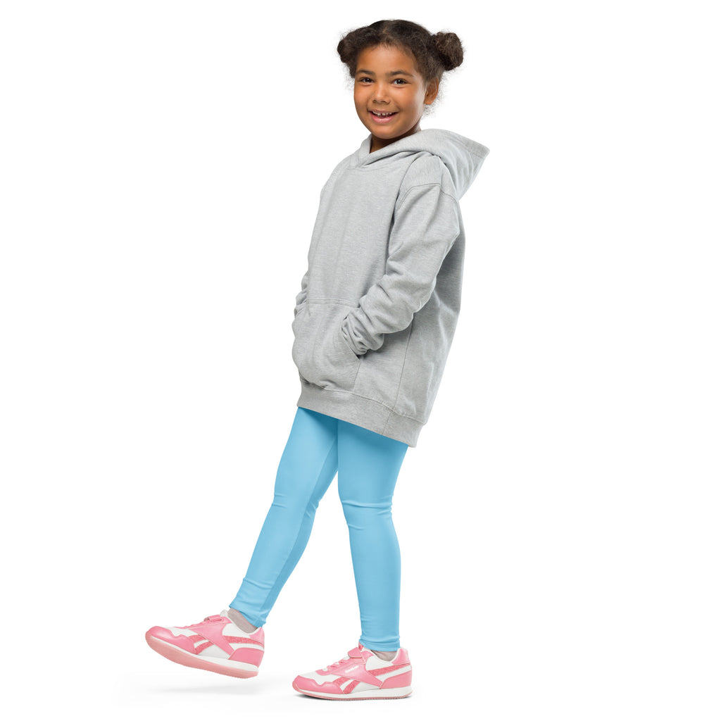 A child wearing a light gray hooded sweatshirt and kids buttery soft sky blue leggings showcasing comfort and style