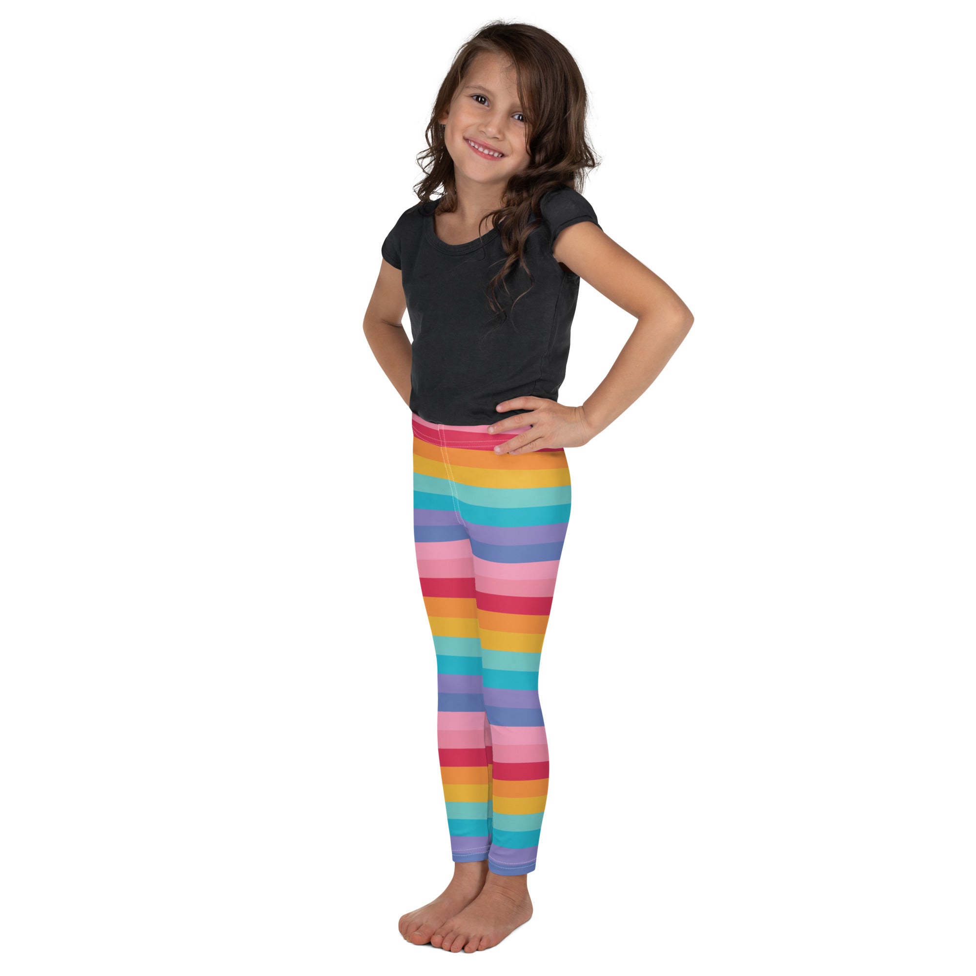 Girls bright rainbow striped buttery soft leggings with vibrant pink orange yellow green blue and purple bands