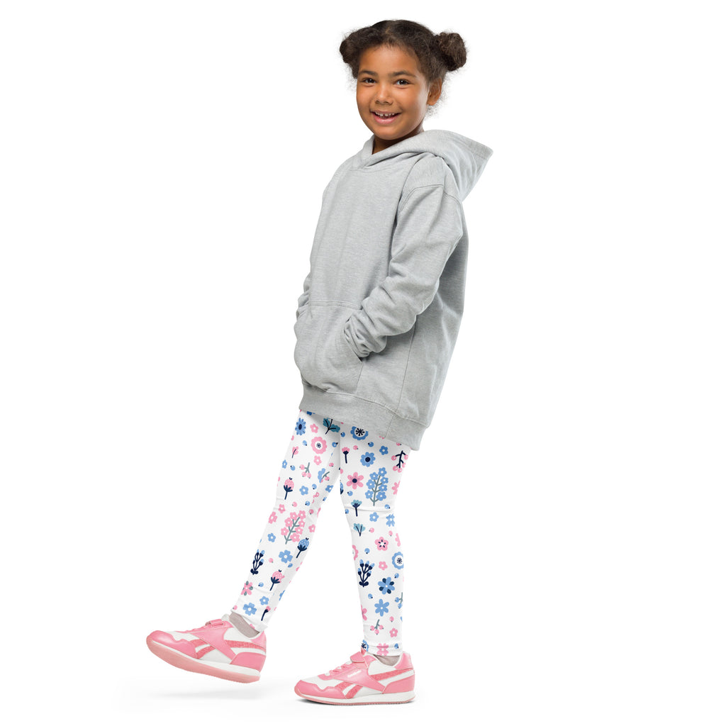 Gray hooded sweatshirt with front pockets and relaxed fit paired with girls floral purple and blue buttery soft leggings