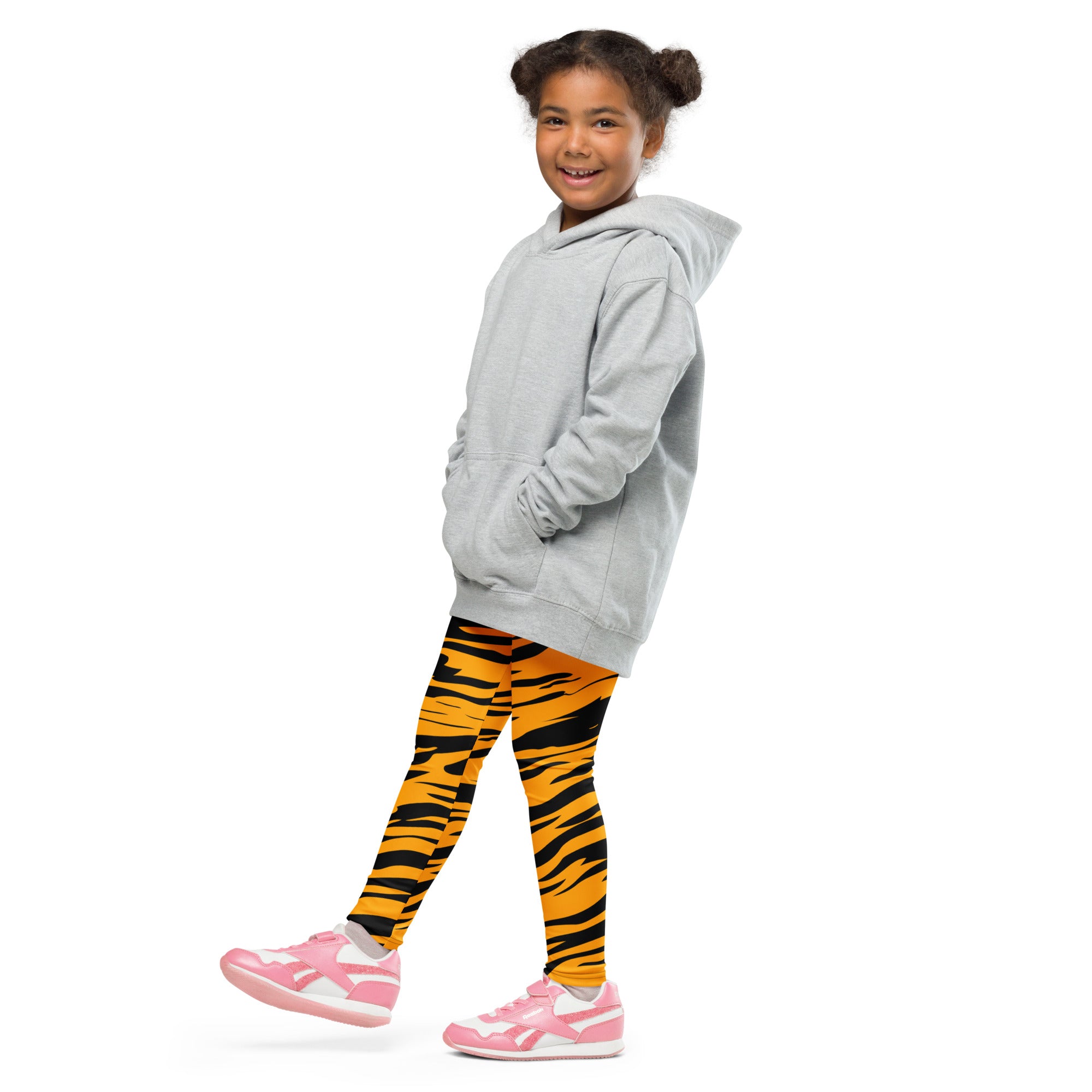 Gray hooded sweatshirt with front pockets and relaxed fit paired with kids tiger stripe buttery soft leggings