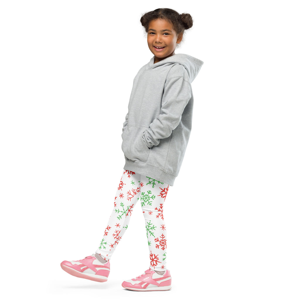 Gray hooded sweatshirt with relaxed fit and front pockets paired with kids red and green snowflake buttery soft leggings