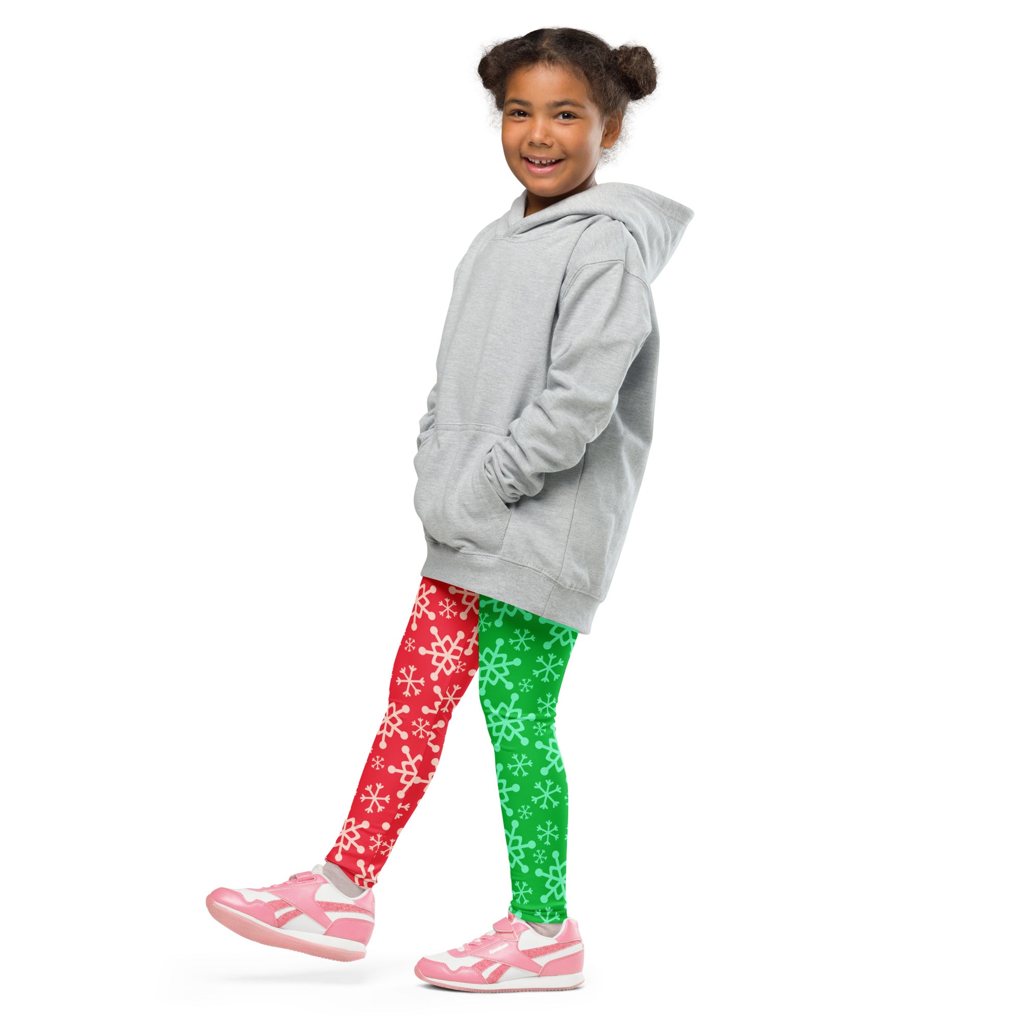 Gray hooded sweatshirt with front pockets and relaxed fit paired with kids red and green snowflake buttery soft leggings