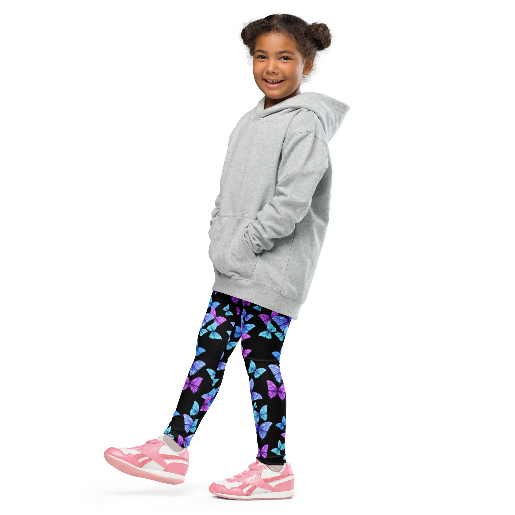 Gray hooded sweatshirt with front pockets and relaxed fit paired with girls vibrant butterfly buttery soft leggings