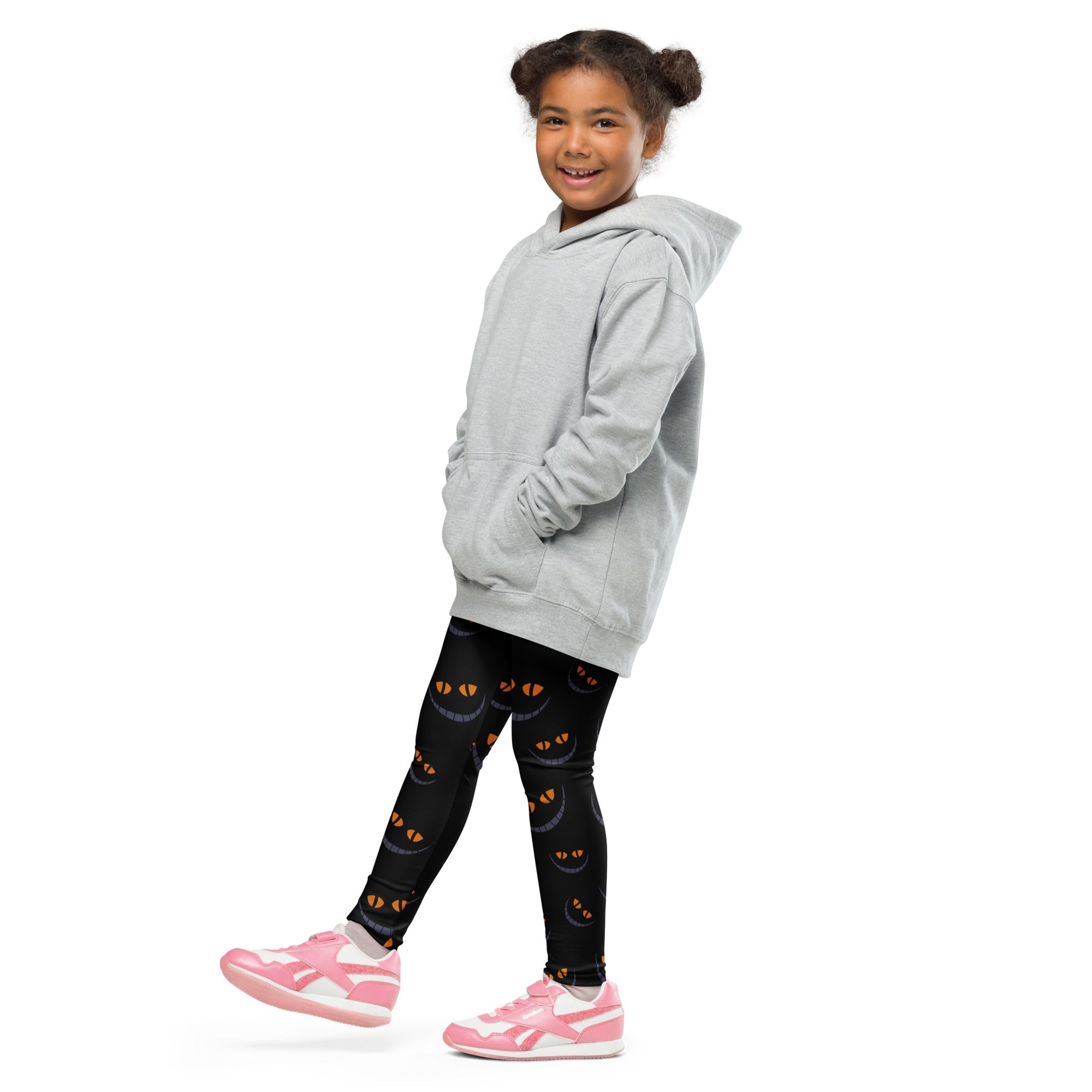 Gray hooded sweatshirt with front pockets and relaxed fit paired with kids Halloween grinning cat buttery soft leggings