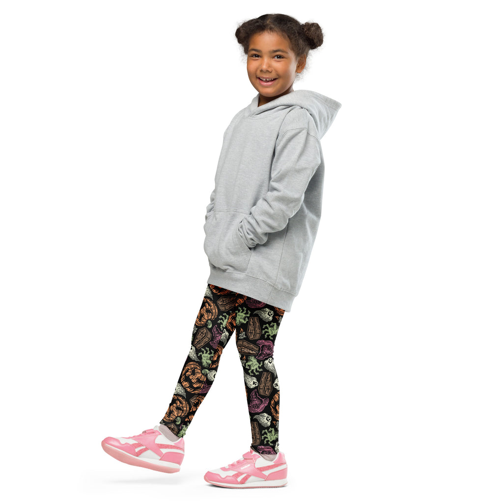Gray hooded sweatshirt with relaxed fit and front pockets paired with kids creepy halloween buttery soft leggings
