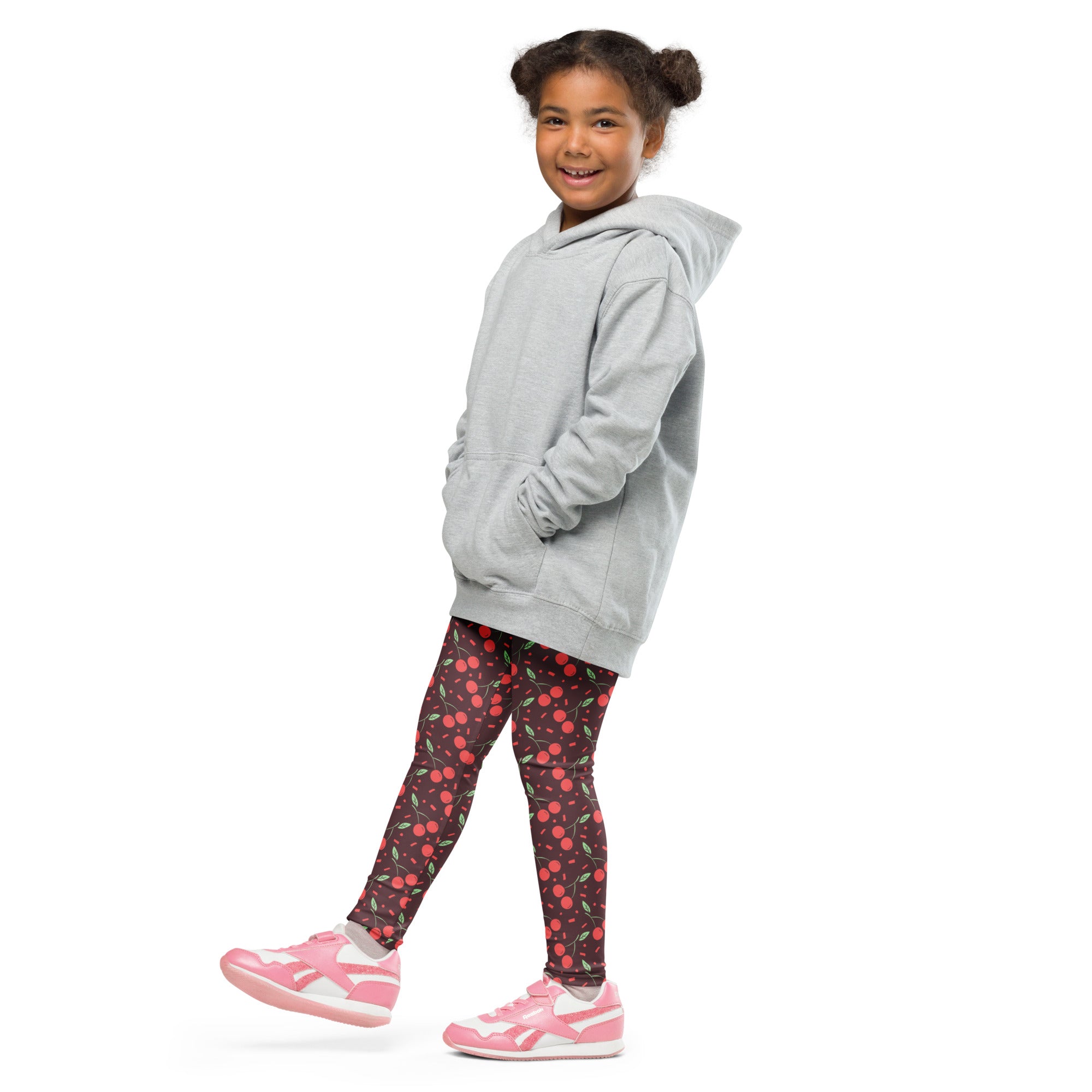 Gray hooded sweatshirt with front pockets and relaxed fit shown alongside girls cherry print buttery soft leggings