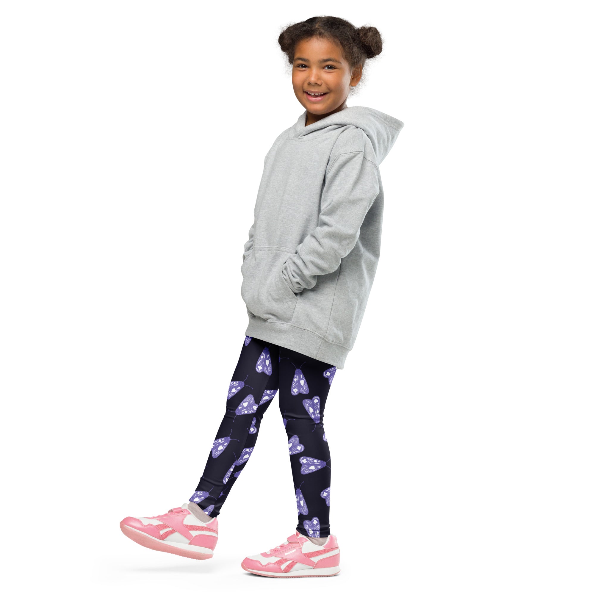 Gray hooded sweatshirt with relaxed fit front pockets paired with girls purple moth buttery soft leggings