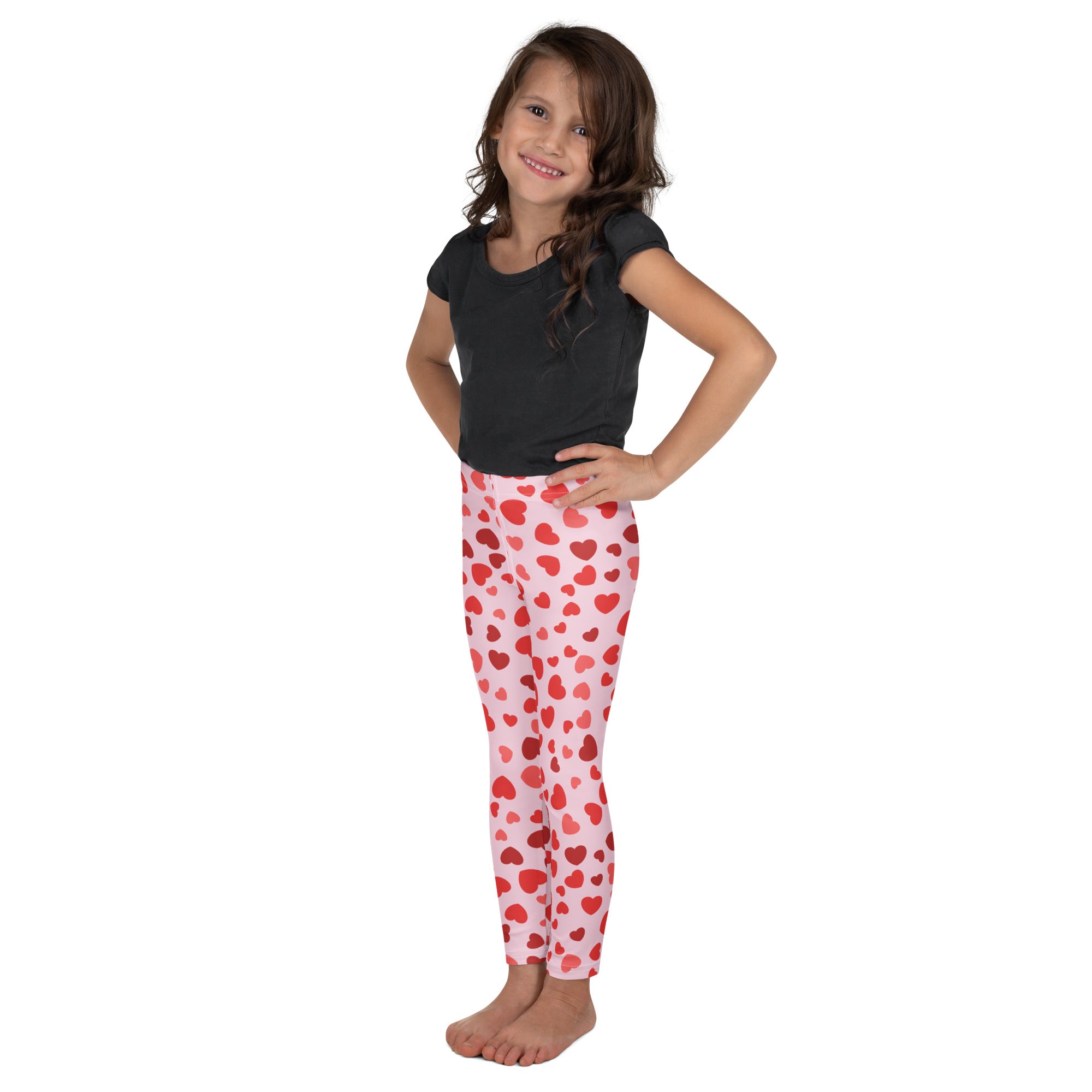 Girls Valentines Day pink buttery soft leggings with red heart pattern for comfortable festive wear