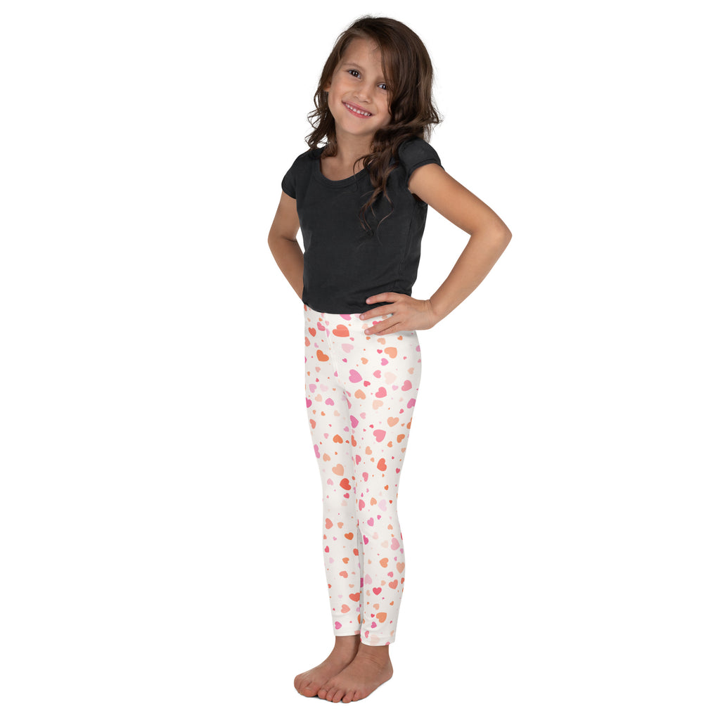Girls pastel heart buttery soft white leggings with playful pink and orange heart pattern perfect for everyday wear