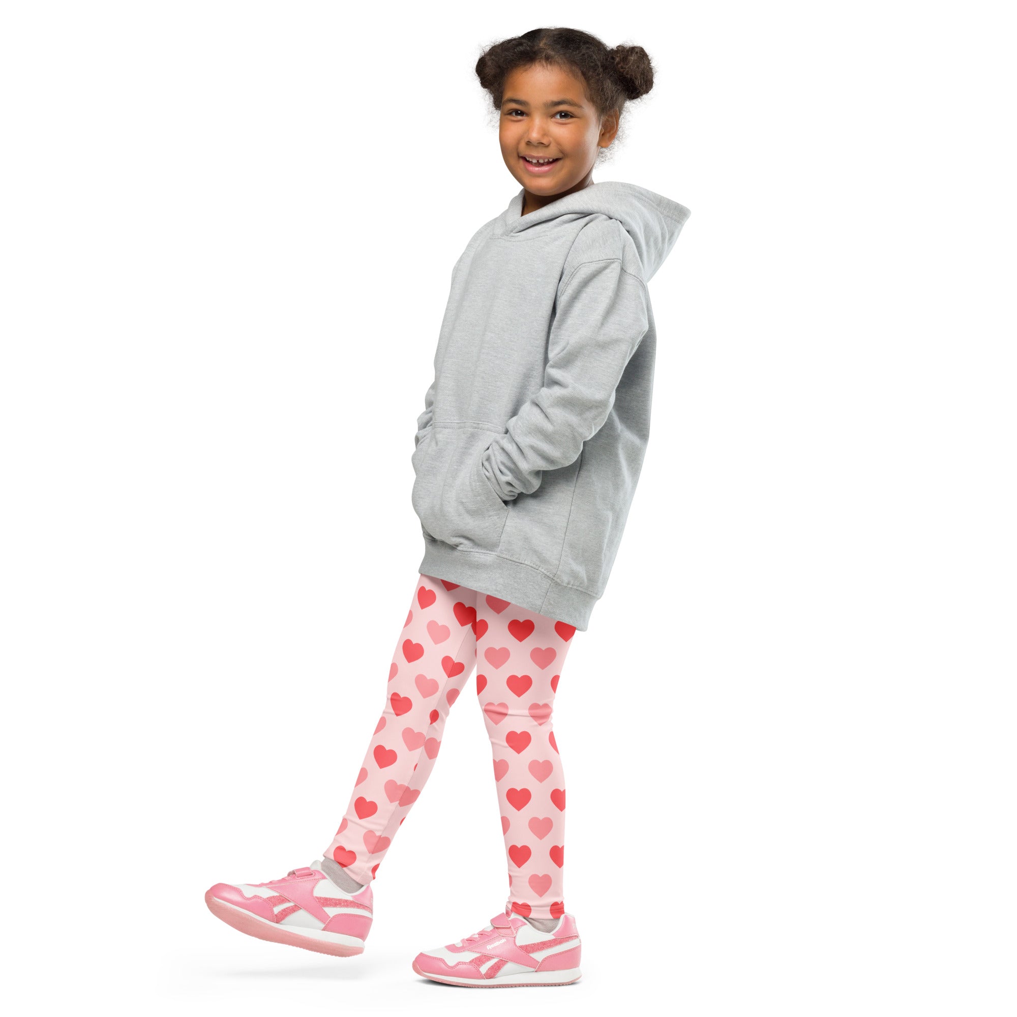 Gray hooded sweatshirt with front pockets and relaxed fit paired with girls blush heart buttery soft leggings