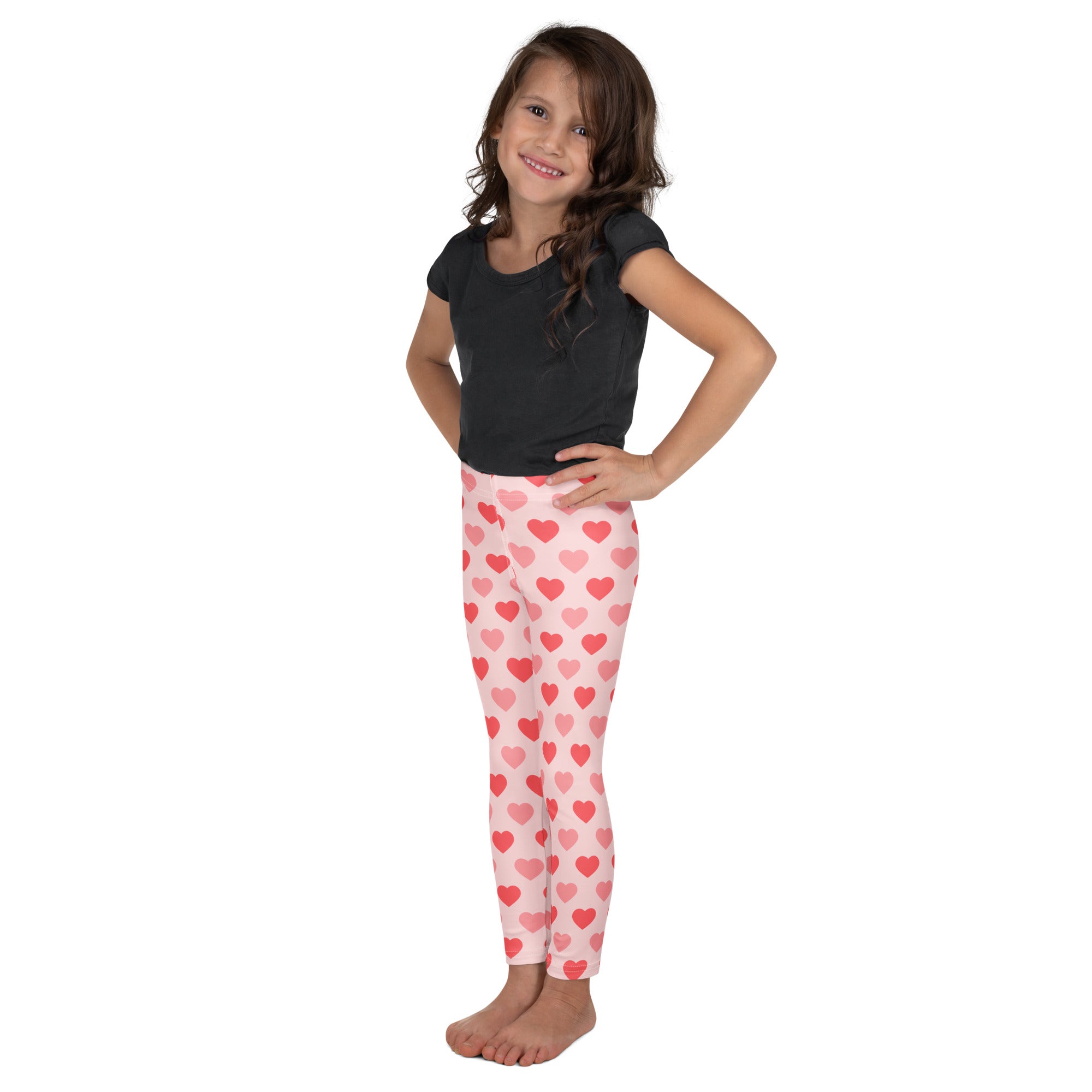 Girls blush heart buttery soft leggings in pink with red and light pink heart pattern made from soft fabric