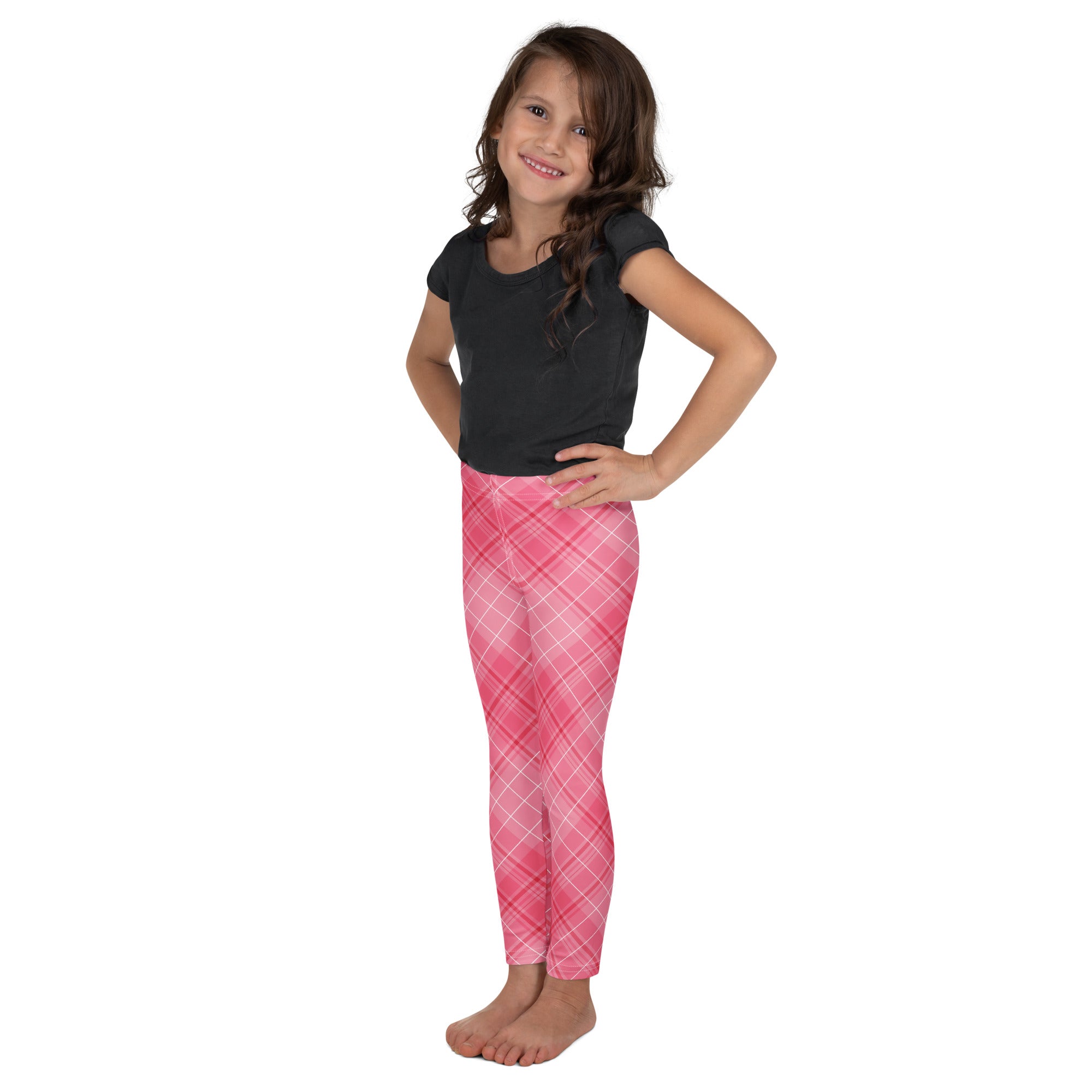 Girls pink plaid buttery soft leggings with gradient light to dark pink and white intersecting lines pattern