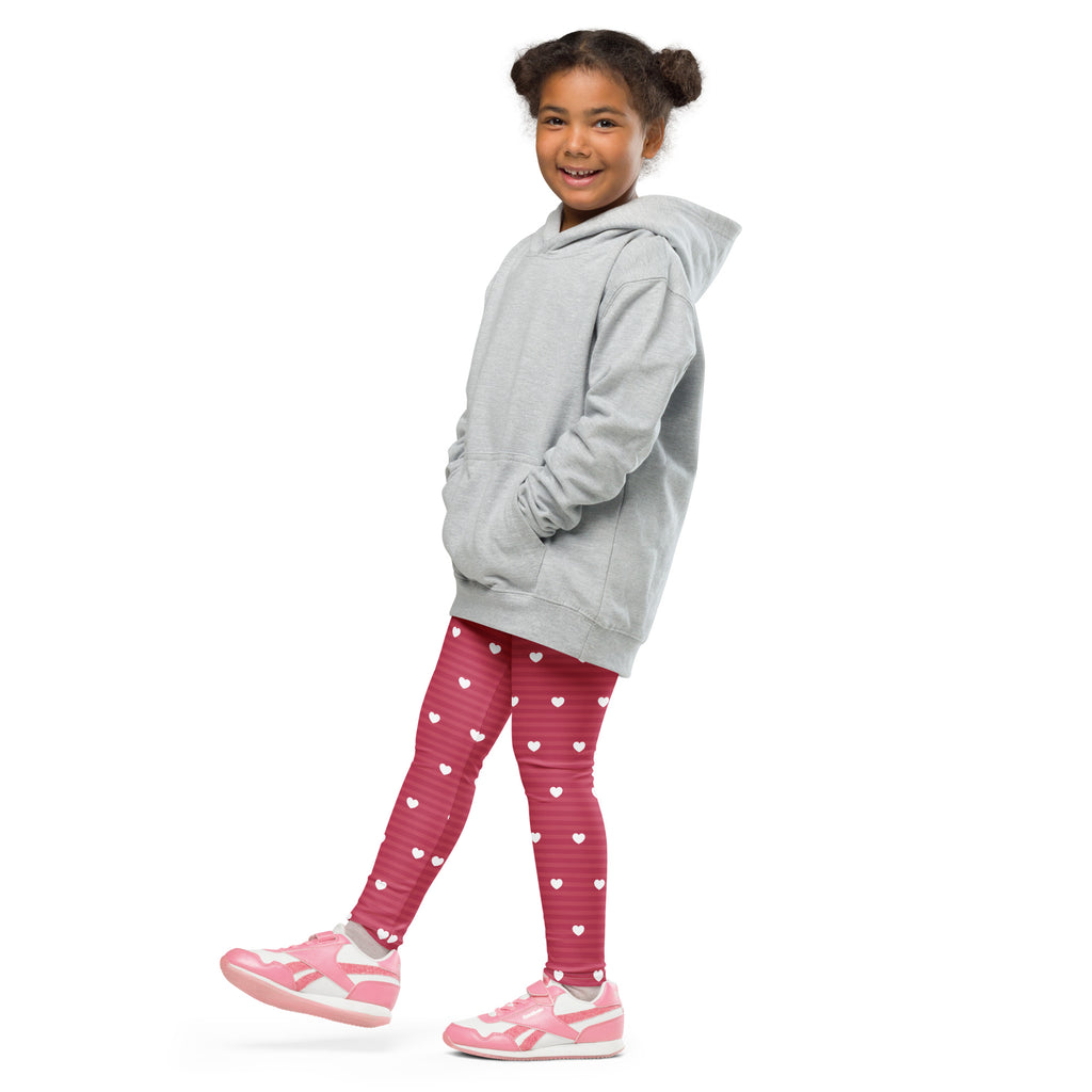 Gray hooded sweatshirt with front pockets and relaxed fit paired with girls pink stripe heart buttery soft leggings