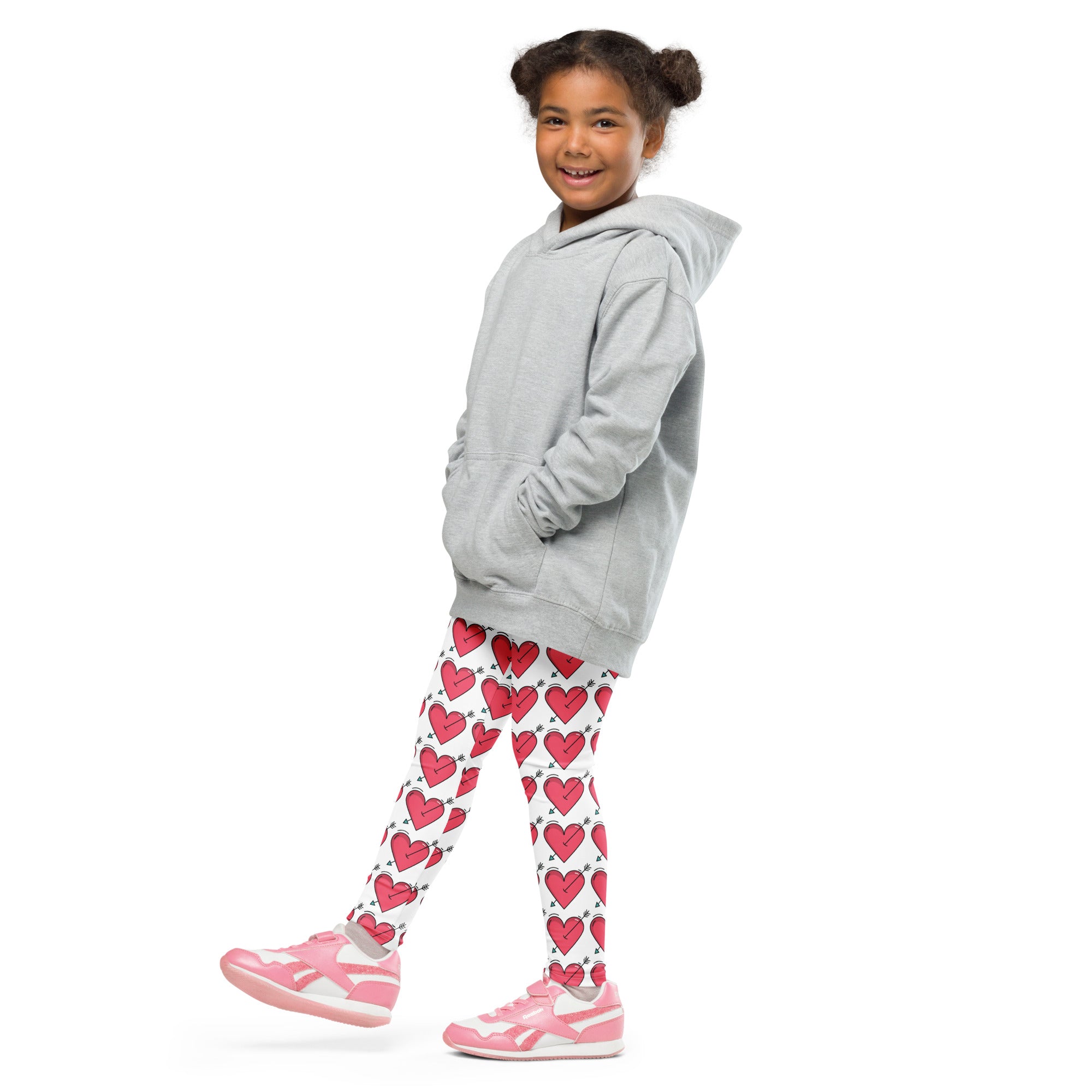 Gray hooded sweatshirt with front pockets and relaxed fit paired with girls arrow heart valentine’s day leggings buttery soft