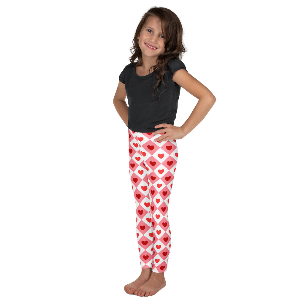 Girls pink argyle heart leggings in buttery soft fabric with pink and red hearts and white diamond grid design