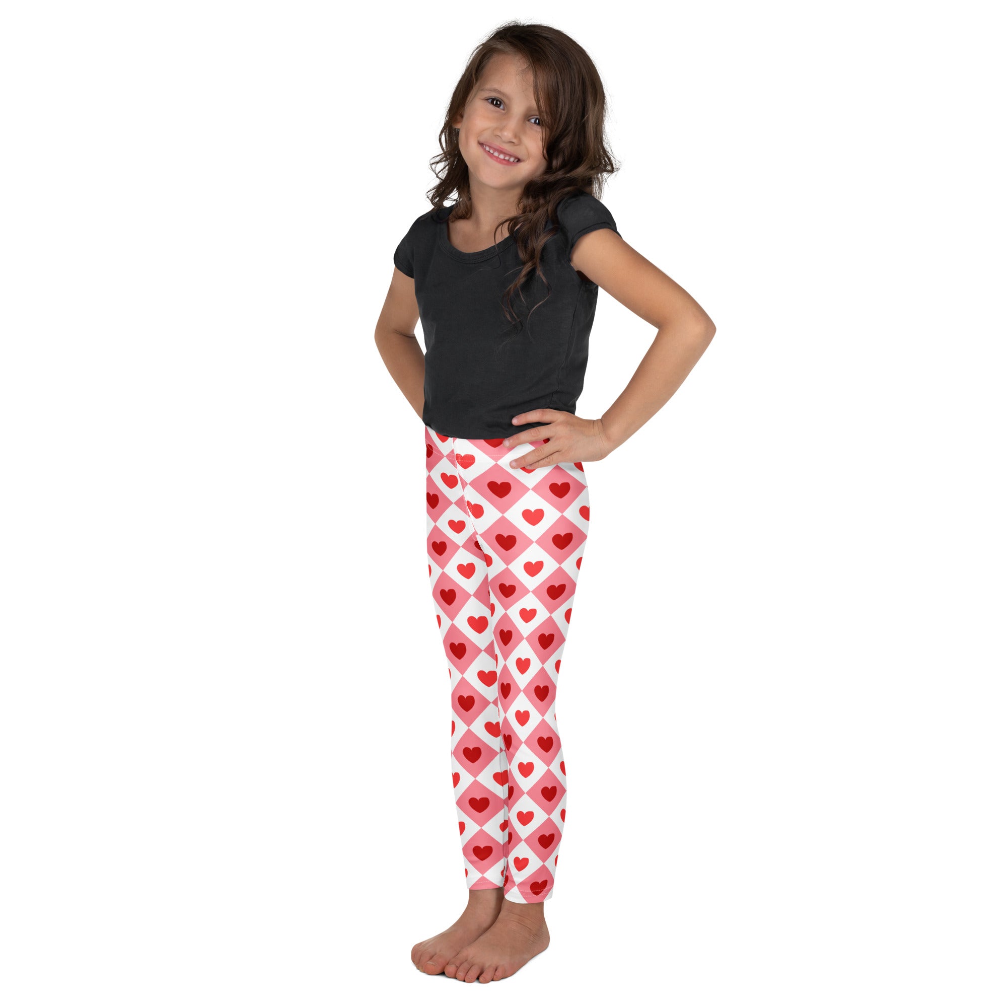 Girls pink argyle heart leggings in buttery soft fabric with pink and red hearts and white diamond grid design