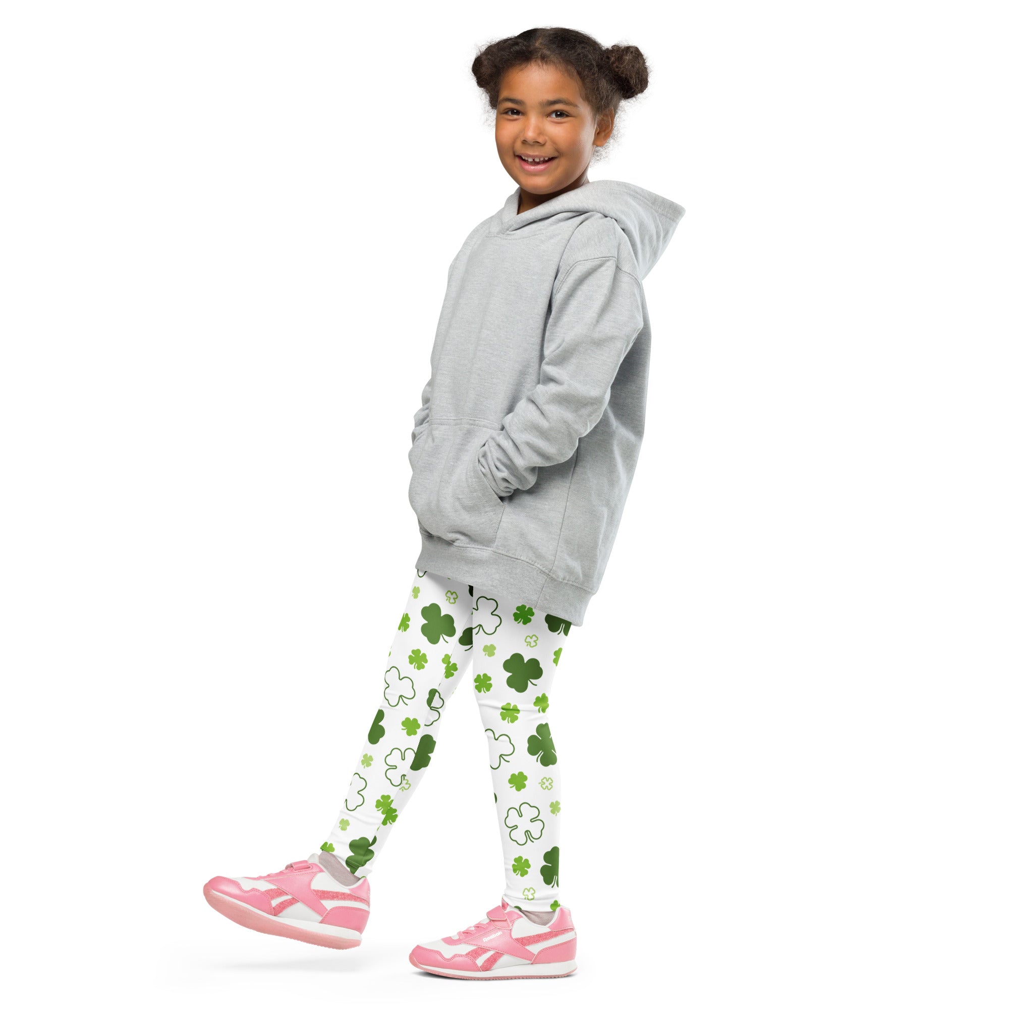 Gray hooded sweatshirt with front pockets and relaxed fit shown with girls white shamrock buttery soft leggings