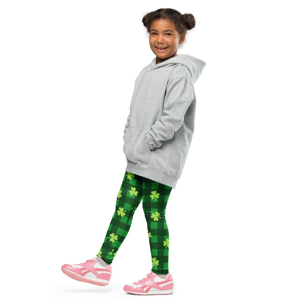 Gray hooded sweatshirt with front pockets and relaxed fit paired with girls green plaid shamrock buttery soft leggings