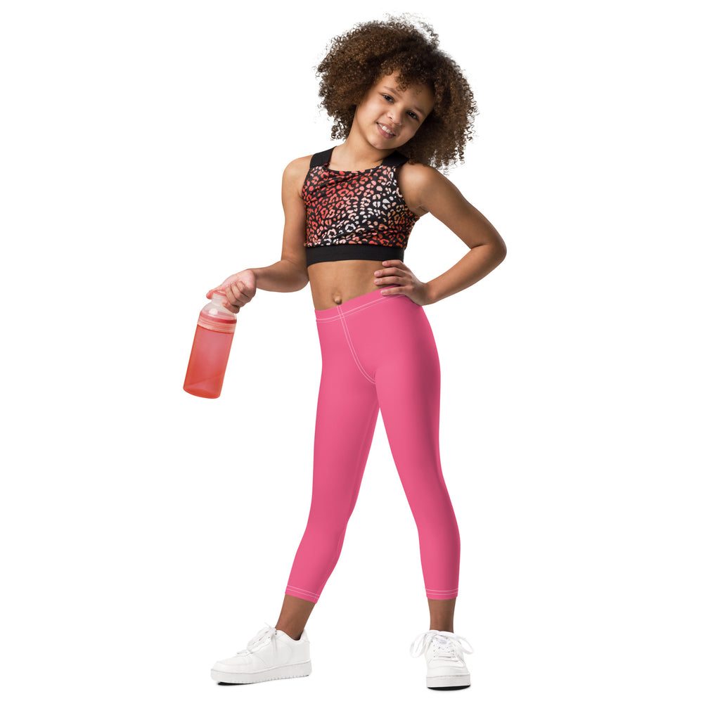 Girls buttery soft pink leggings made of smooth stretchy fabric with a high waisted design