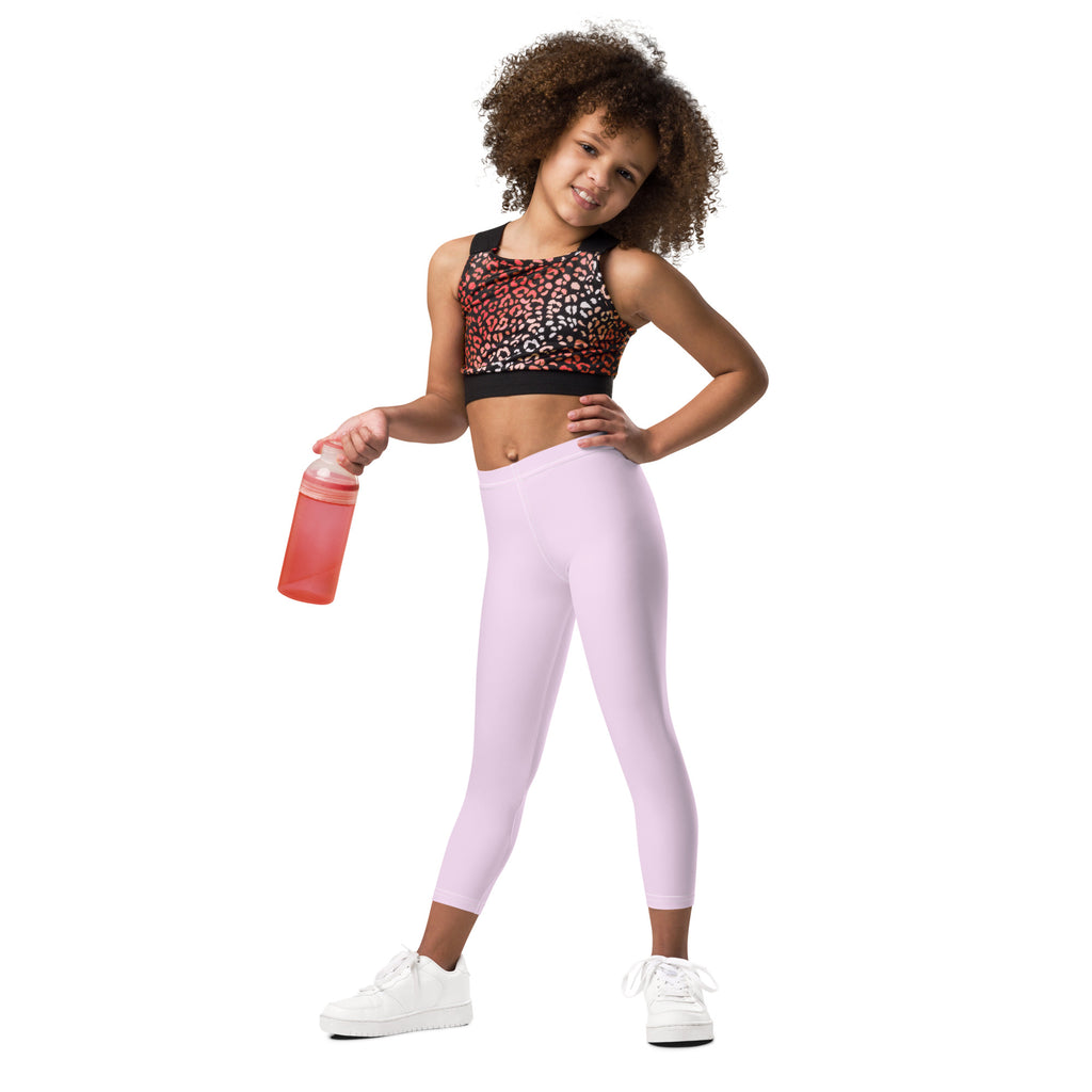 Girls buttery soft light pink leggings with smooth stretchy fabric and a high waistband for comfortable wear