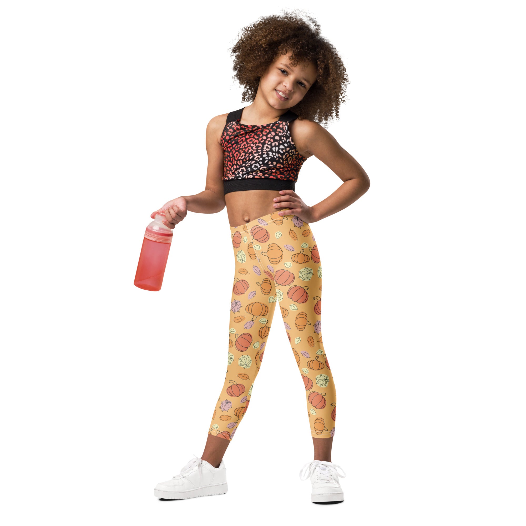 Kids pumpkin patch buttery soft yellow leggings with playful pumpkin and leaf pattern for fall wear