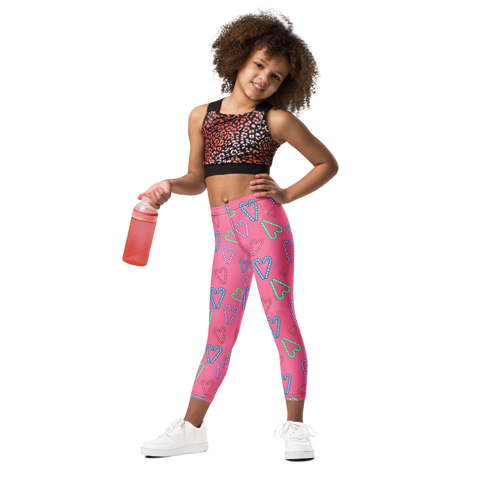 Girls pink candy cane heart buttery soft leggings with multicolored heart pattern and soft fabric for comfort