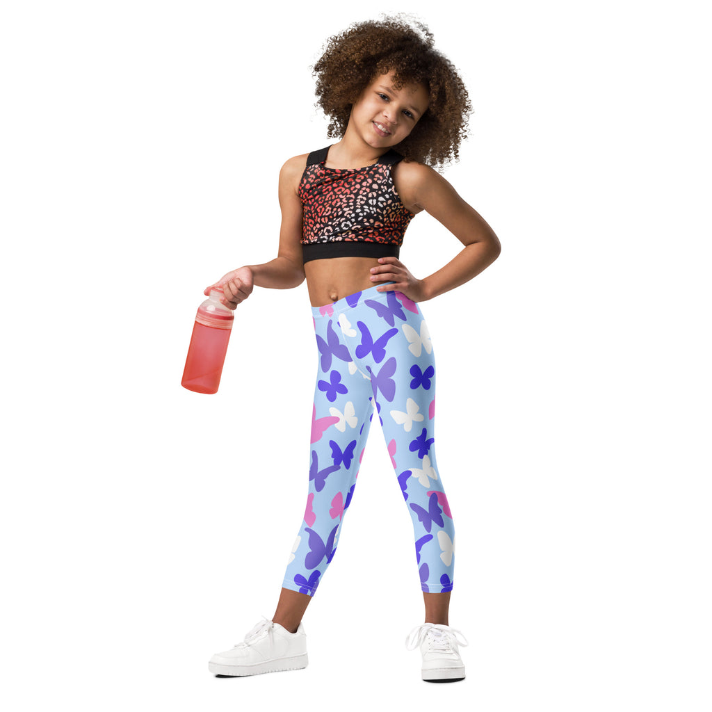 Girls pastel butterfly buttery soft leggings in light blue with a vibrant purple pink and white butterfly pattern