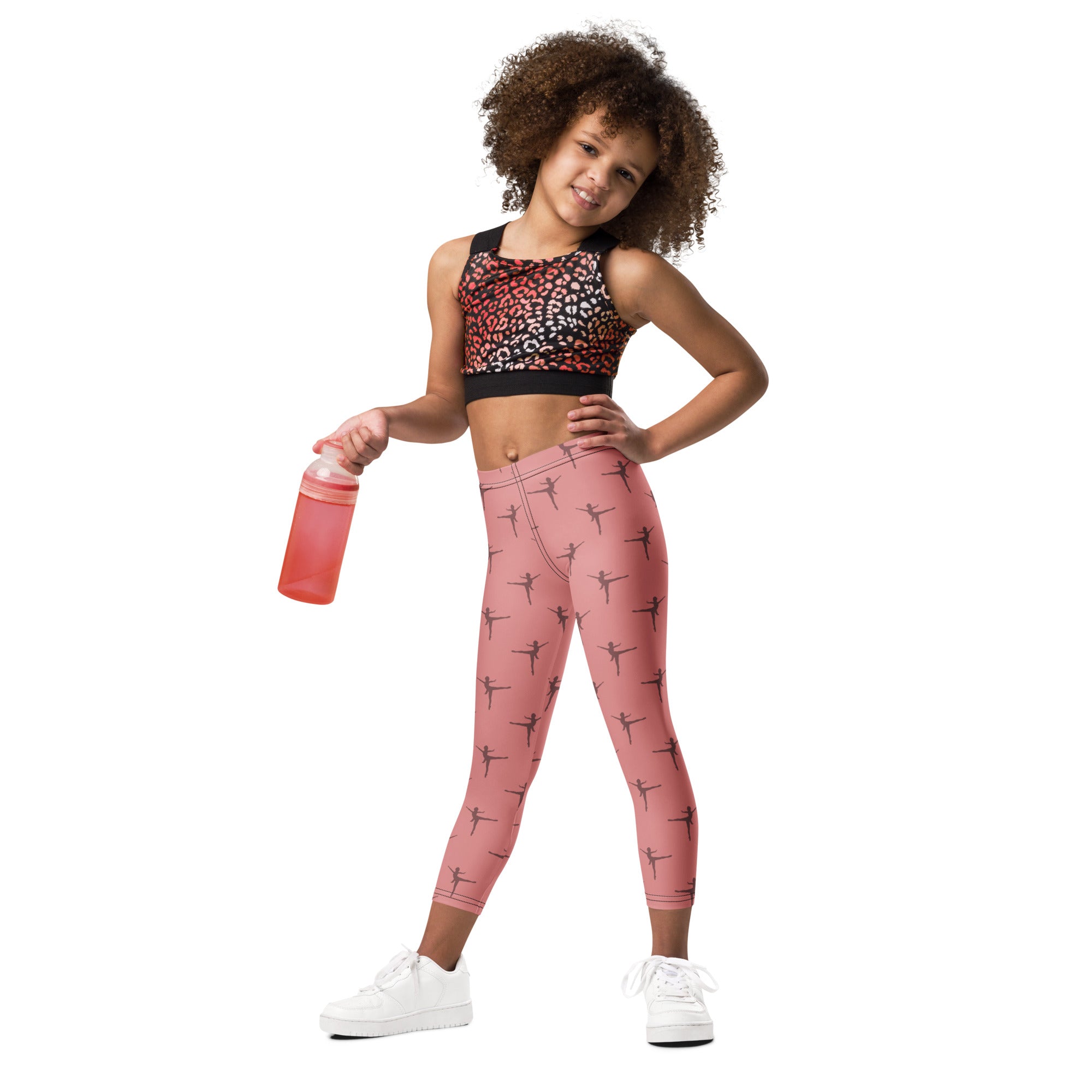 Girls pink dance buttery soft leggings in pink with black ballet dancer silhouettes for dancewear