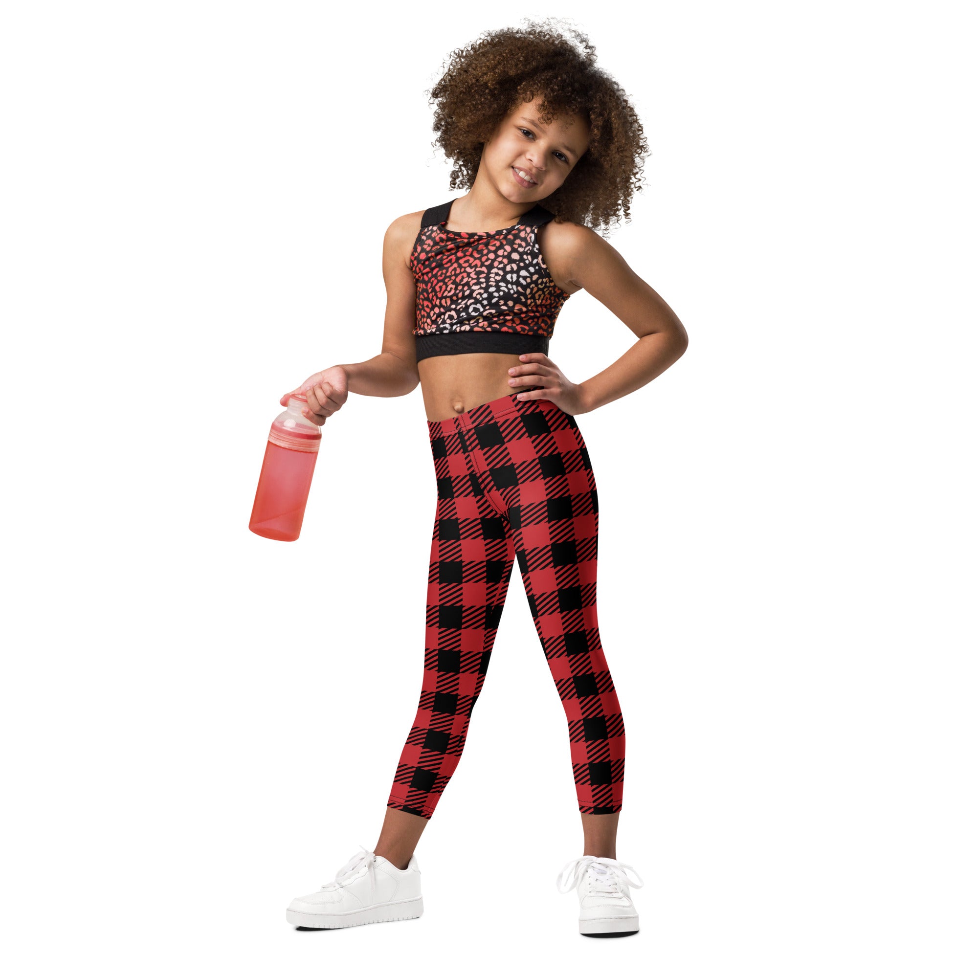 Kids red buffalo plaid buttery soft leggings in red and black plaid featuring a comfortable stretchy fit
