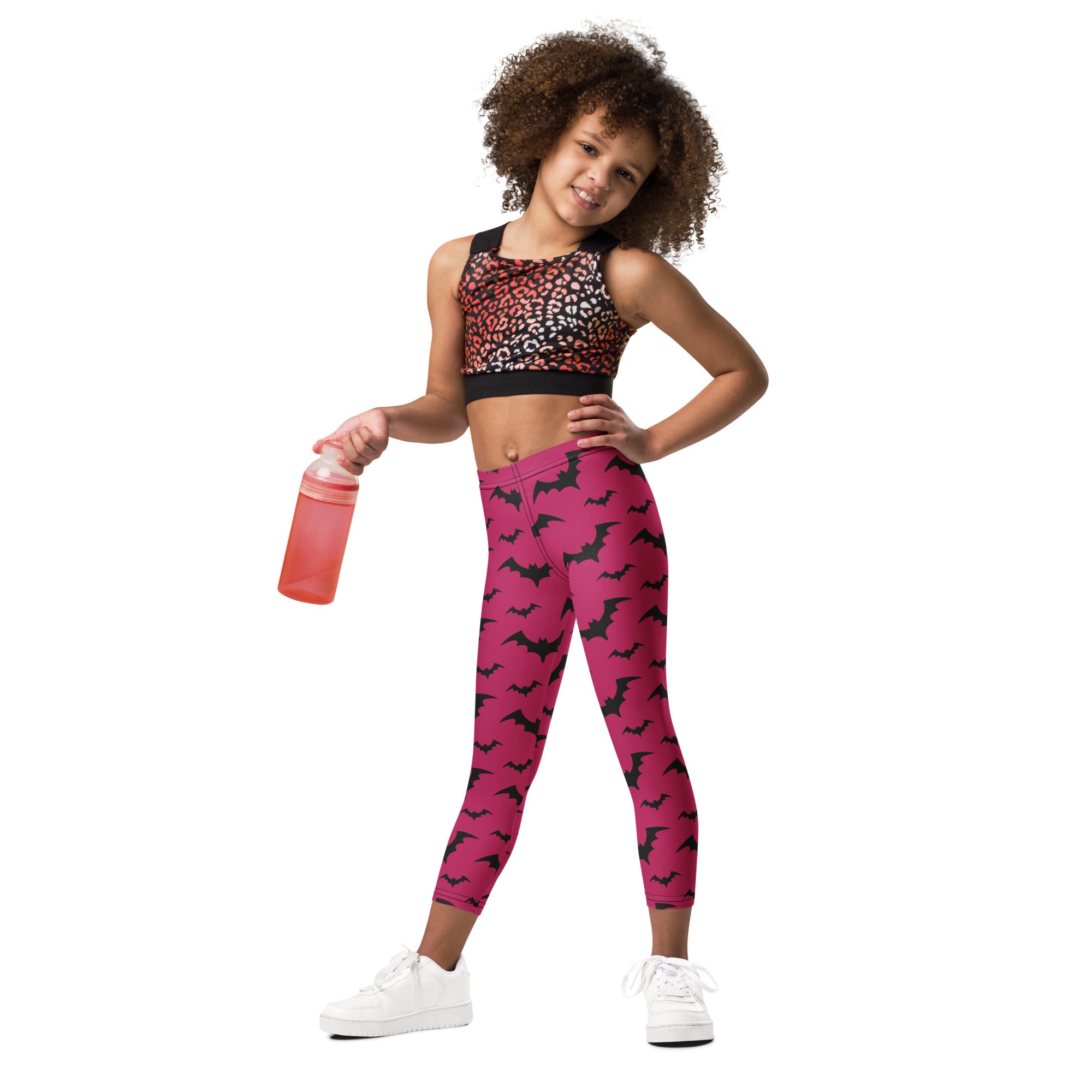 Kids pink bats halloween buttery soft leggings with black bat patterns and stretchy comfortable fabric